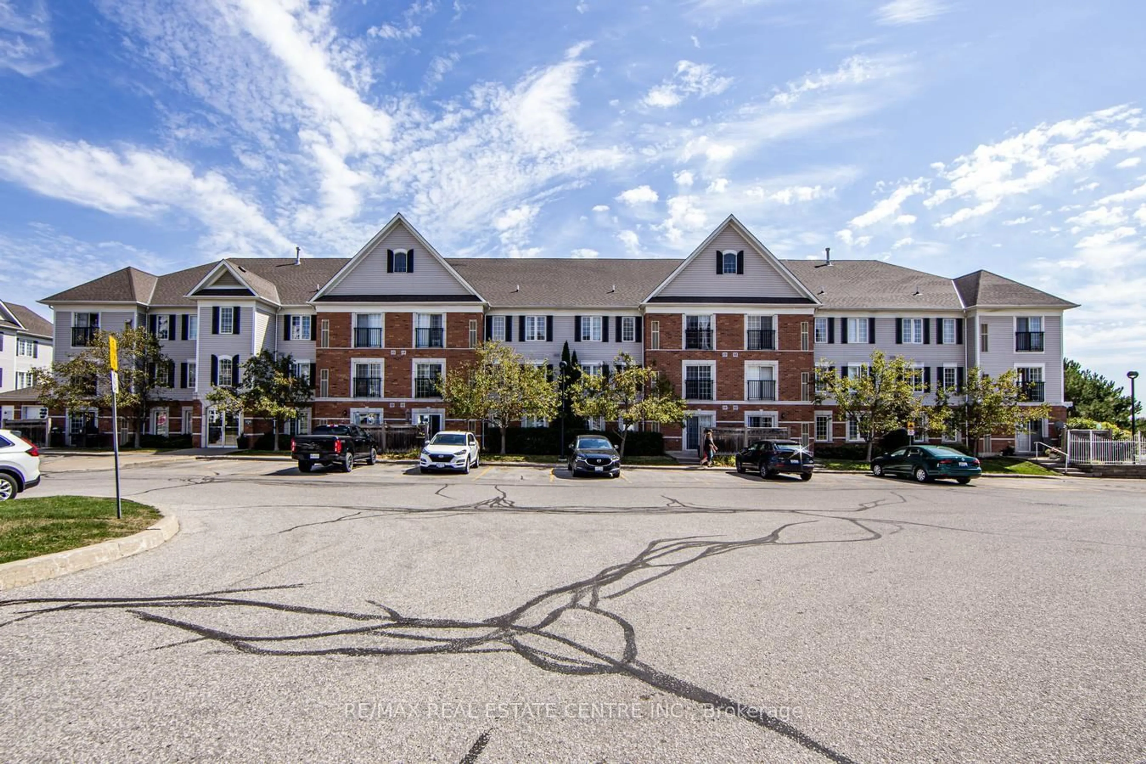 A pic from outside/outdoor area/front of a property/back of a property/a pic from drone, unknown for 106 Aspen Springs Dr #207, Clarington Ontario L1C 5N7