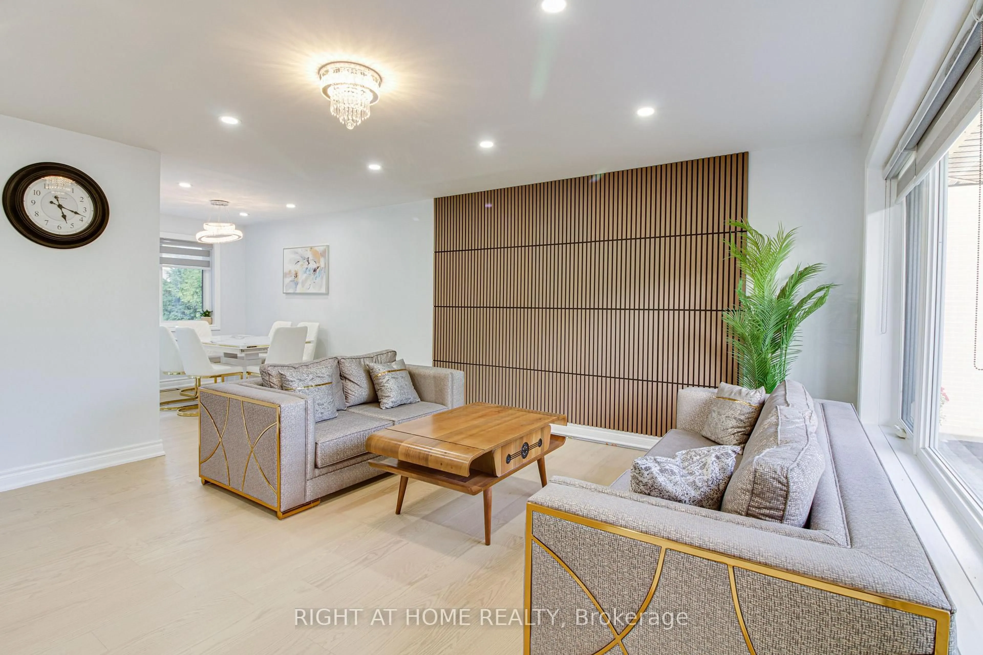Living room with furniture, wood/laminate floor for 32 tara Ave, Toronto Ontario M1K 4B1