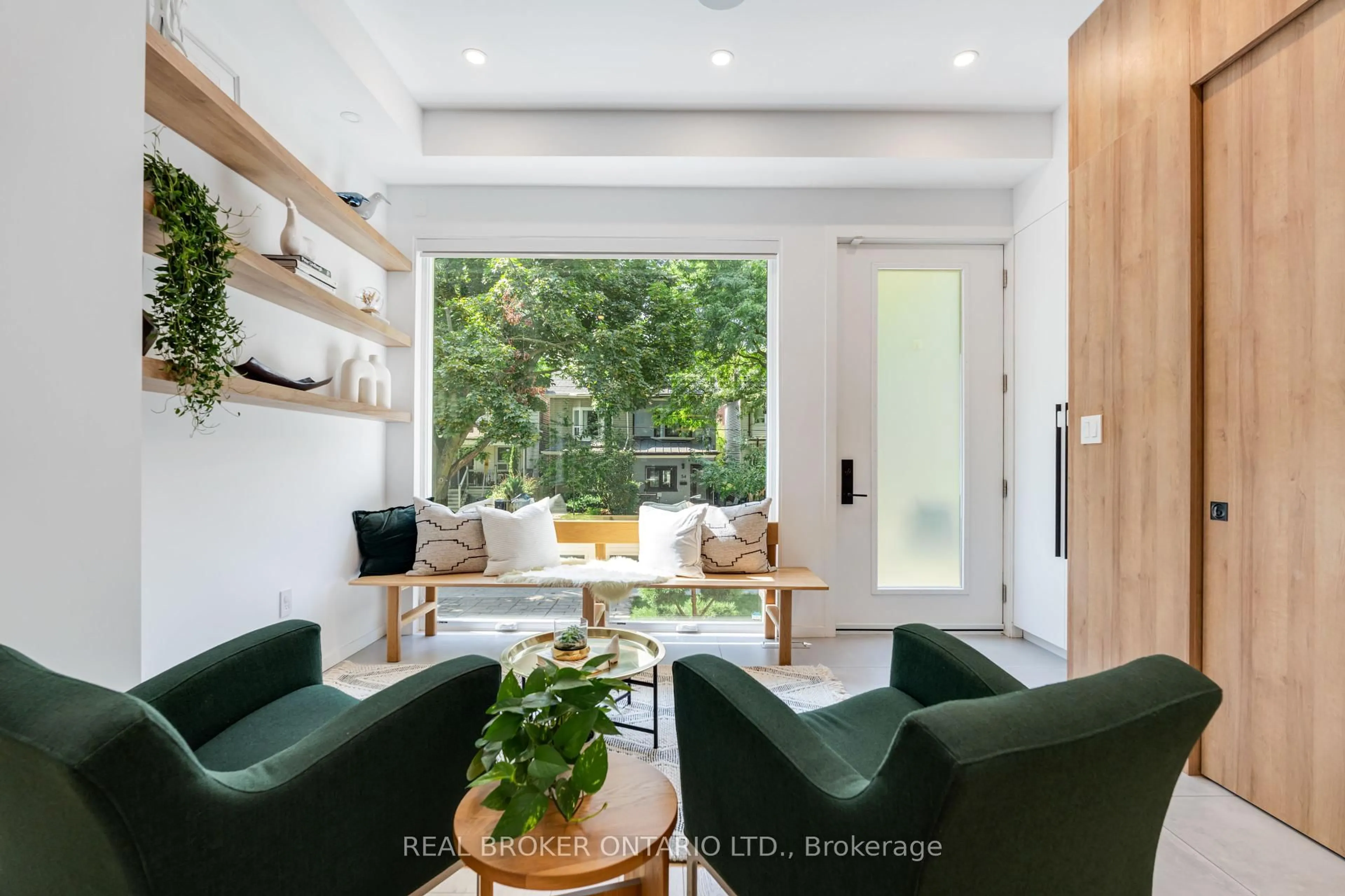 Living room with furniture, unknown for 57 Rhodes Ave, Toronto Ontario M4L 2Z8