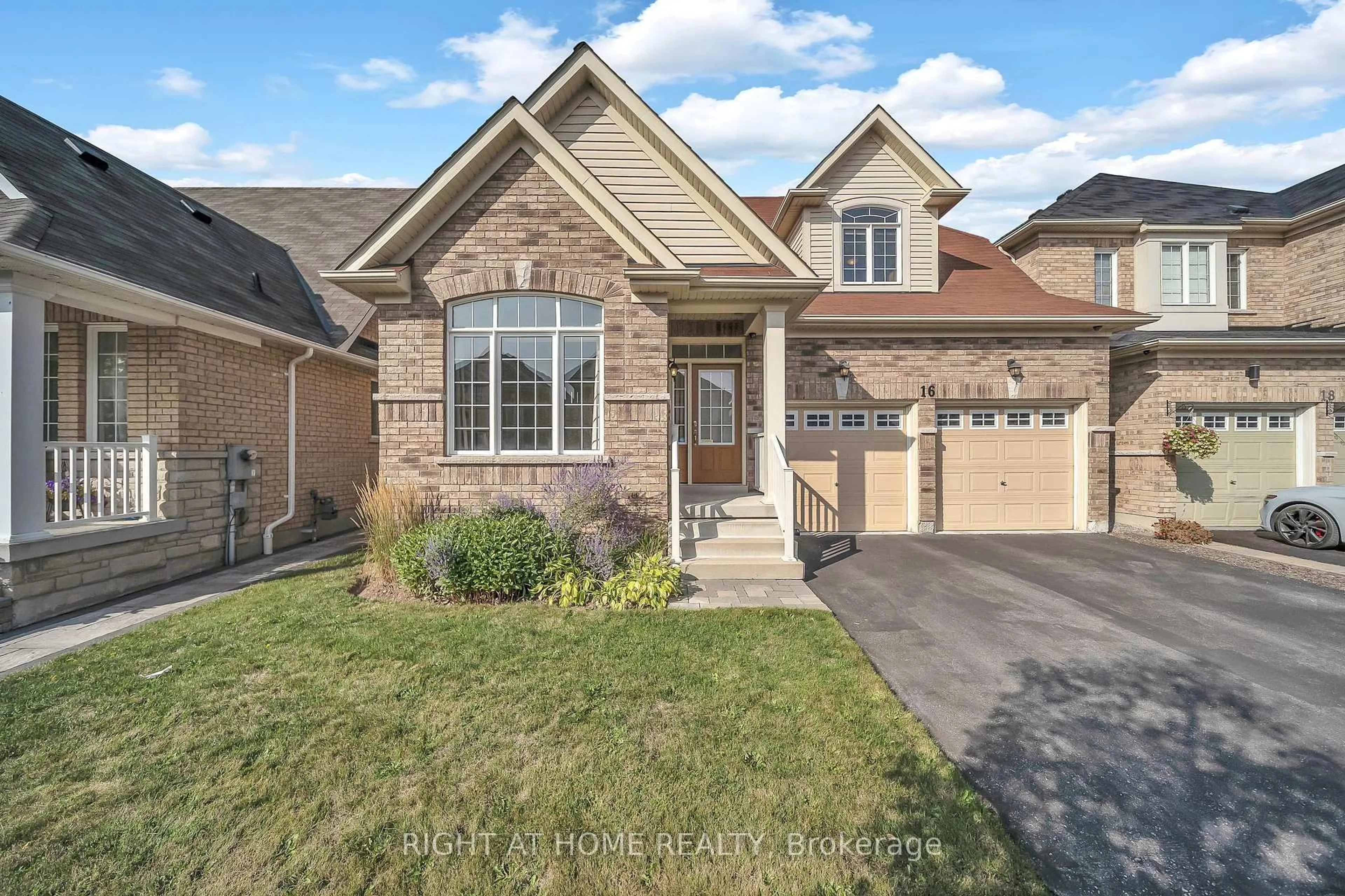 Home with brick exterior material, street for 16 Sewell Cres, Ajax Ontario L1Z 0N7