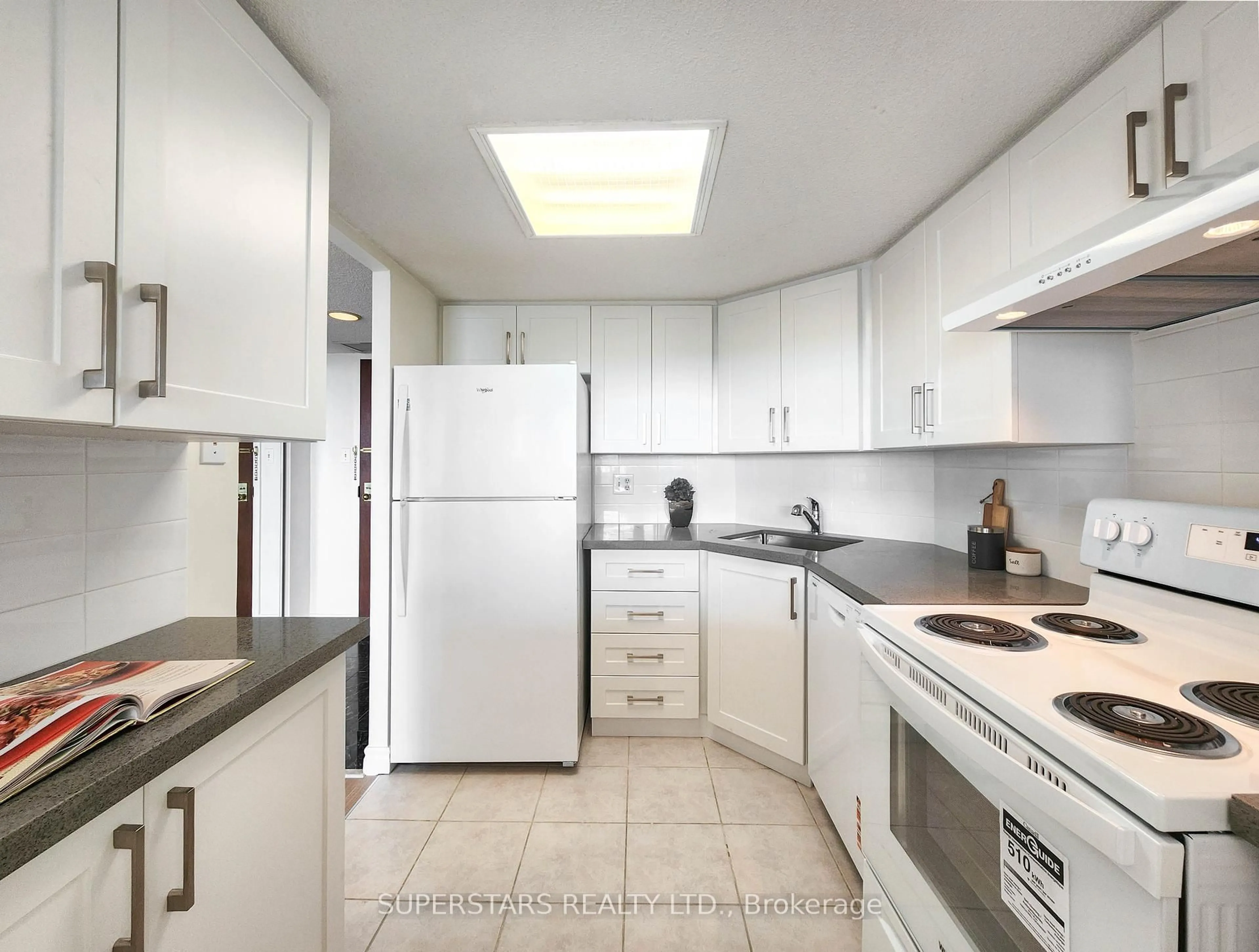 Standard kitchen, ceramic/tile floor for 150 Alton Towers Circ #813, Toronto Ontario M1V 4X7