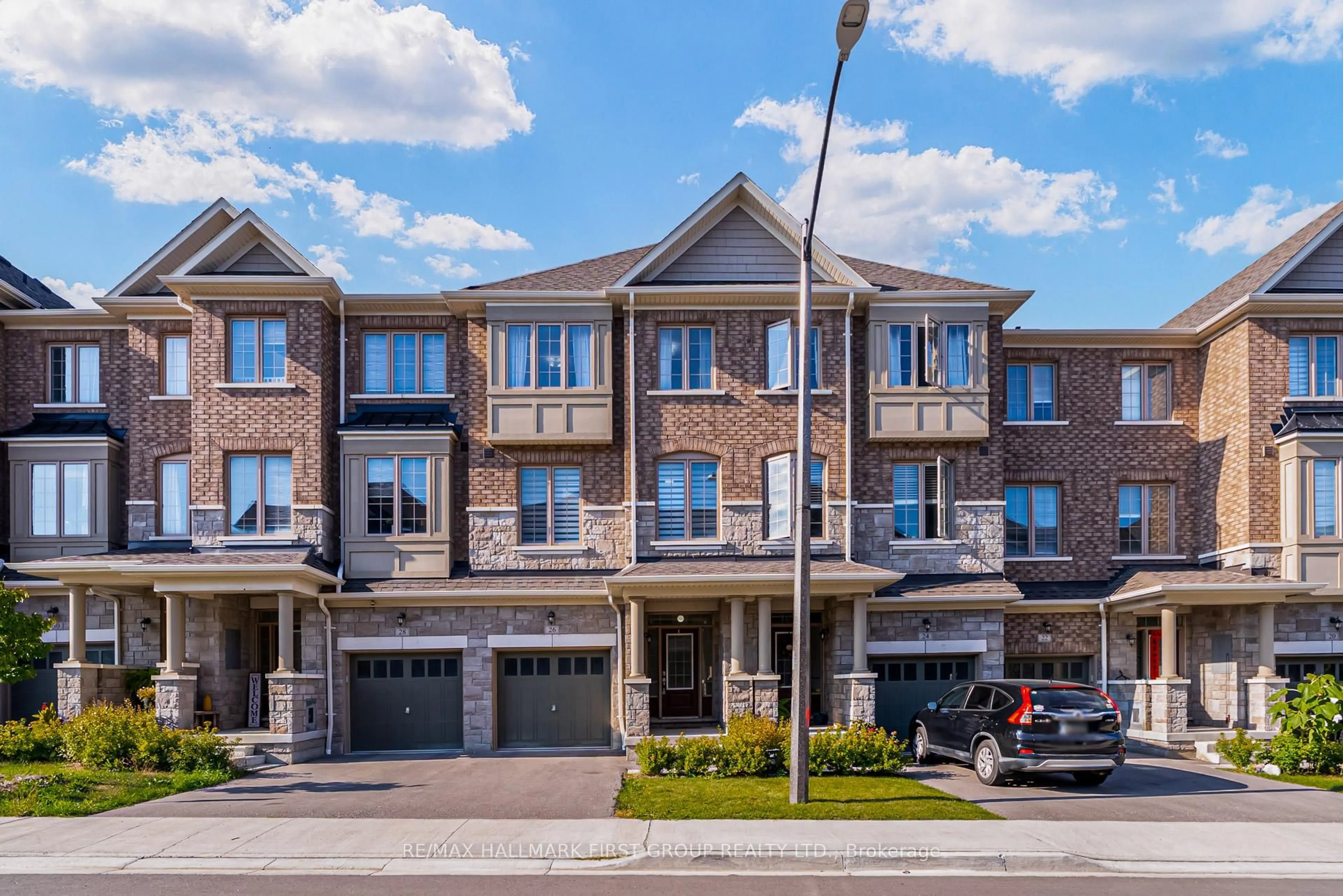 Home with brick exterior material, street for 26 Kingfisher Way, Whitby Ontario L1P 1Y5