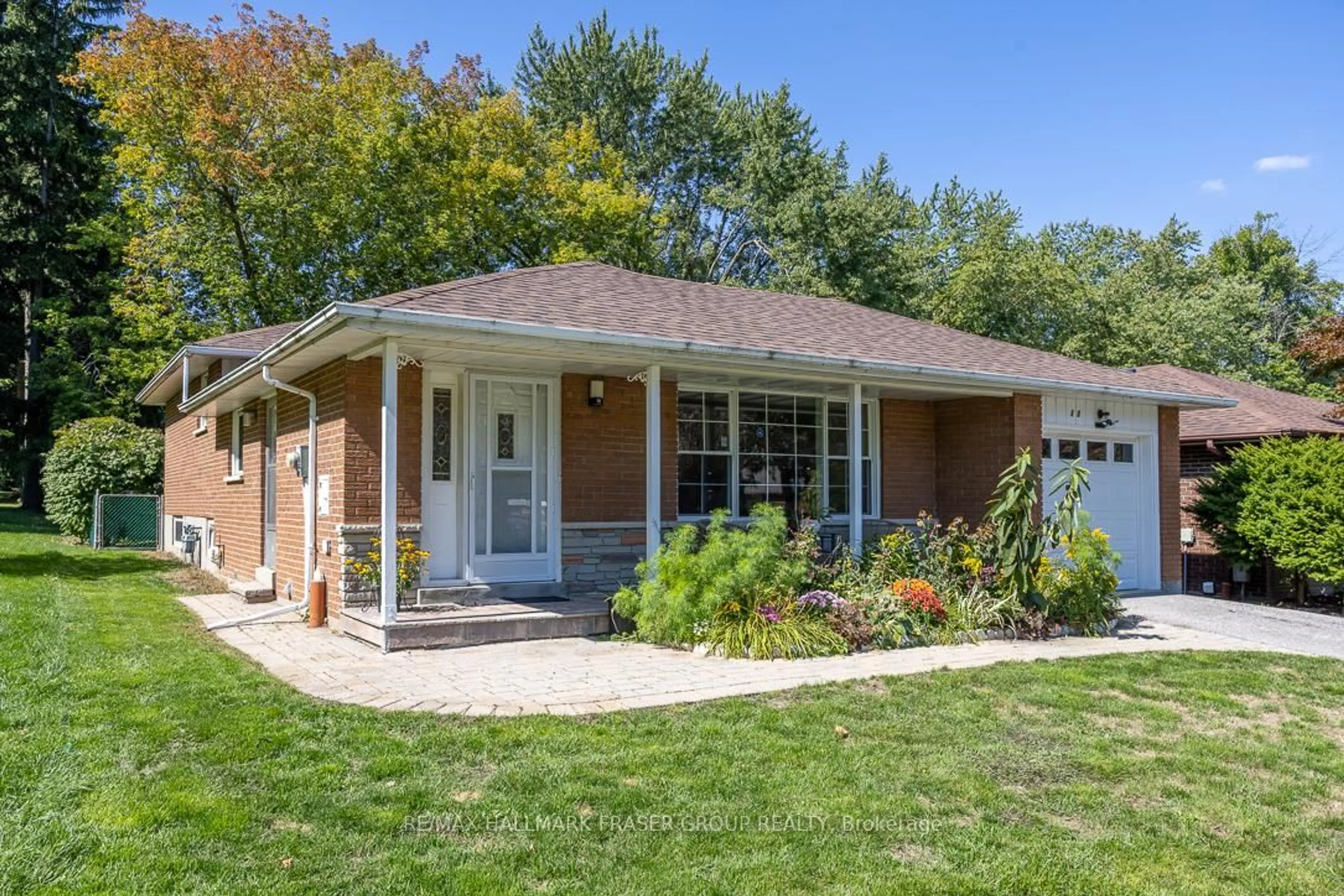 Home with brick exterior material, street for 15 Stanland Dr, Toronto Ontario M1M 2G5