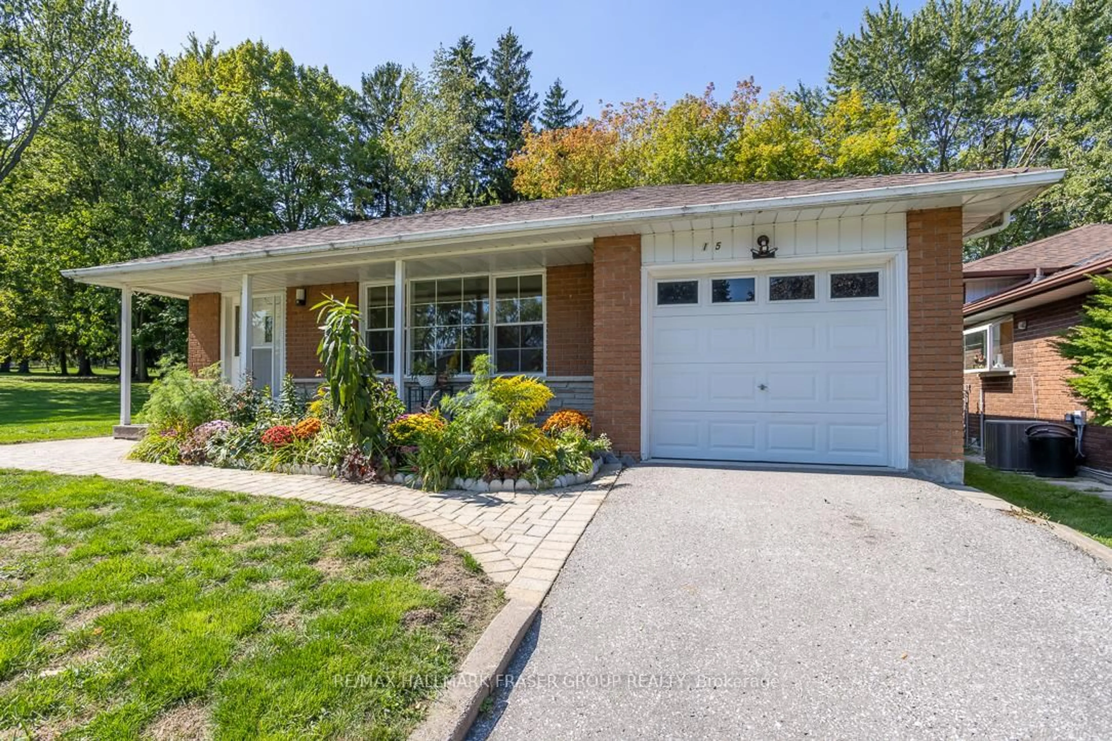 Home with brick exterior material, street for 15 Stanland Dr, Toronto Ontario M1M 2G5