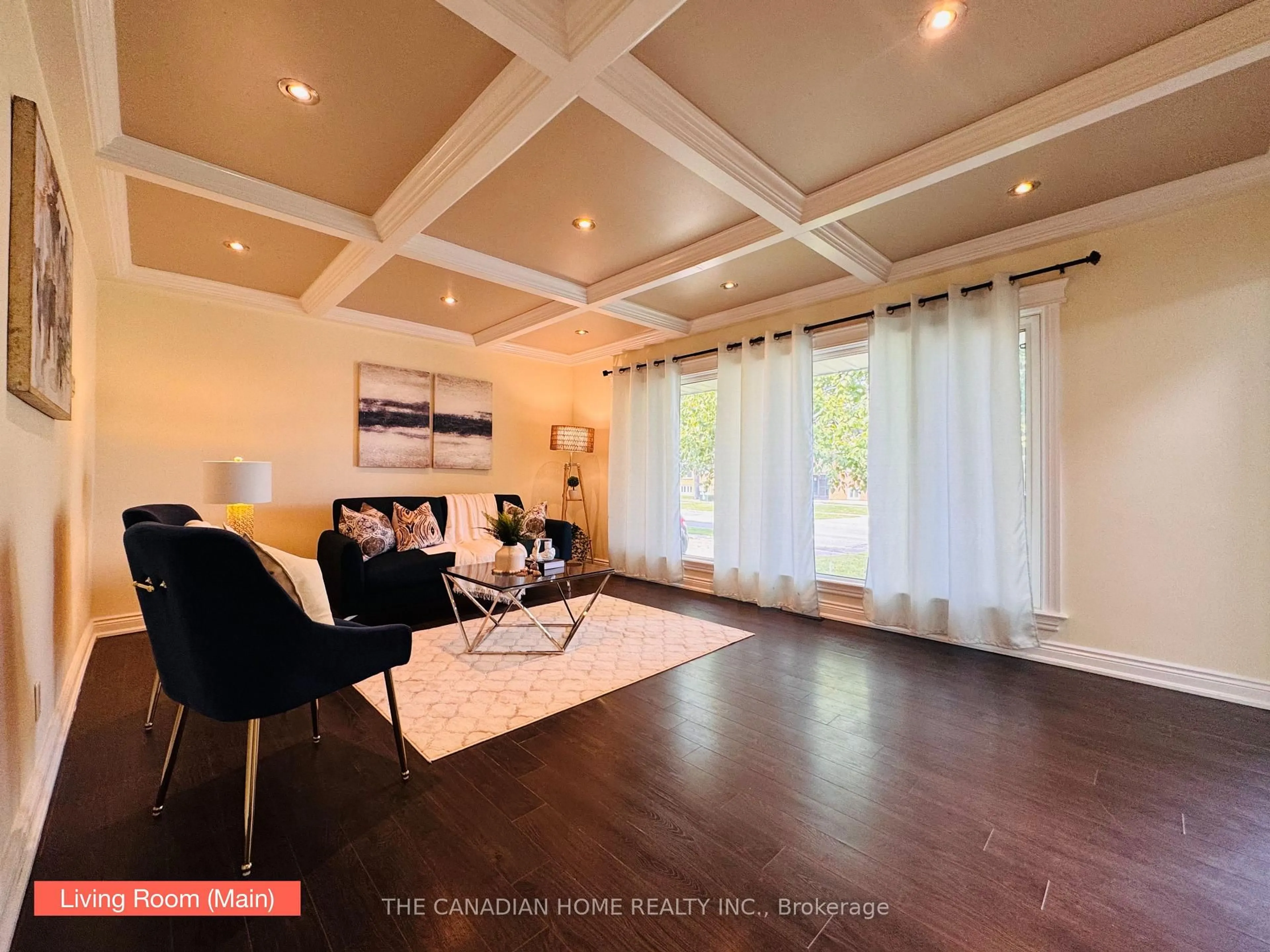 Living room with furniture, wood/laminate floor for 307 Malaga Rd, Oshawa Ontario L1J 1N6
