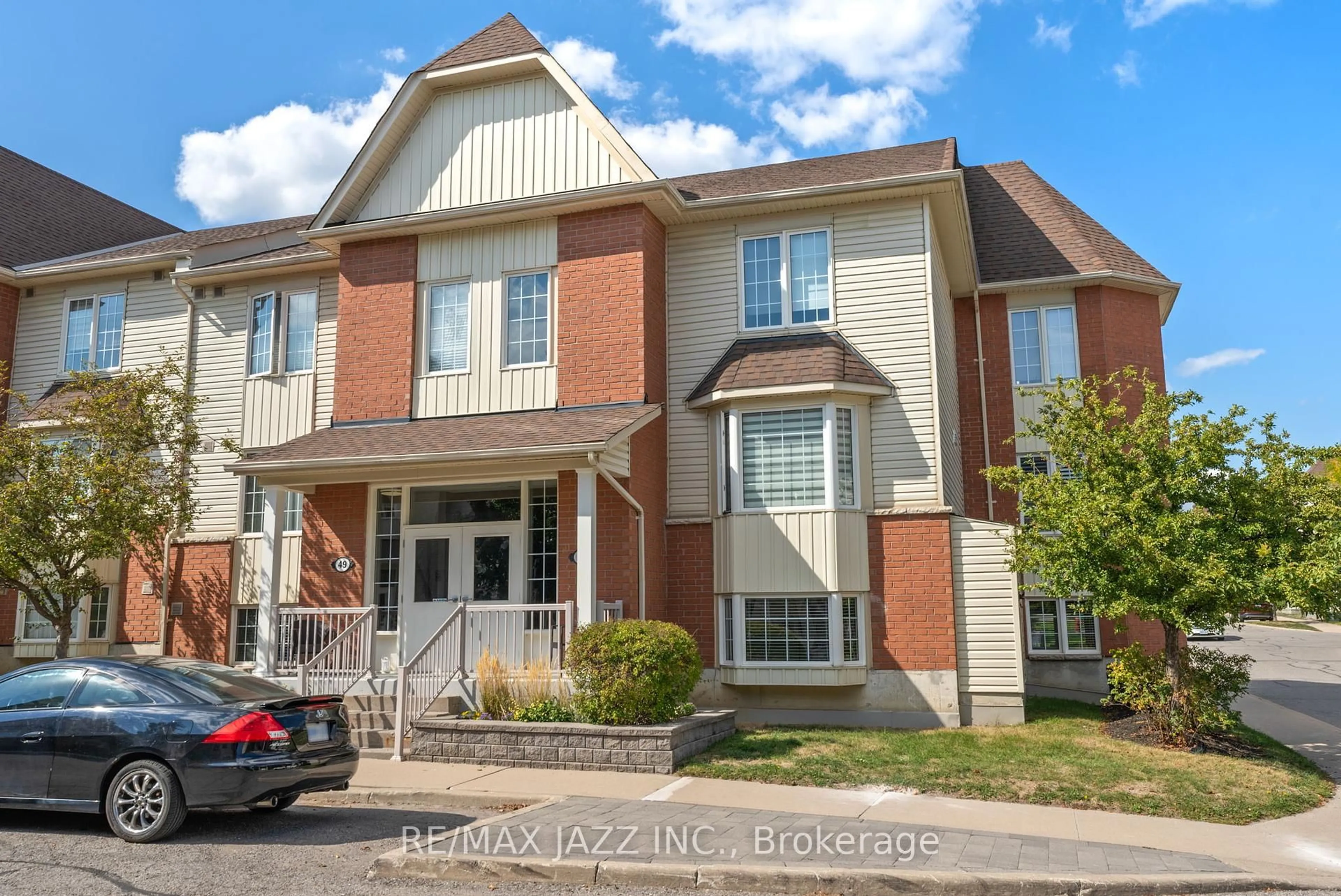 Home with brick exterior material, unknown for 51 PETRA Way #1, Whitby Ontario L1R 0A8