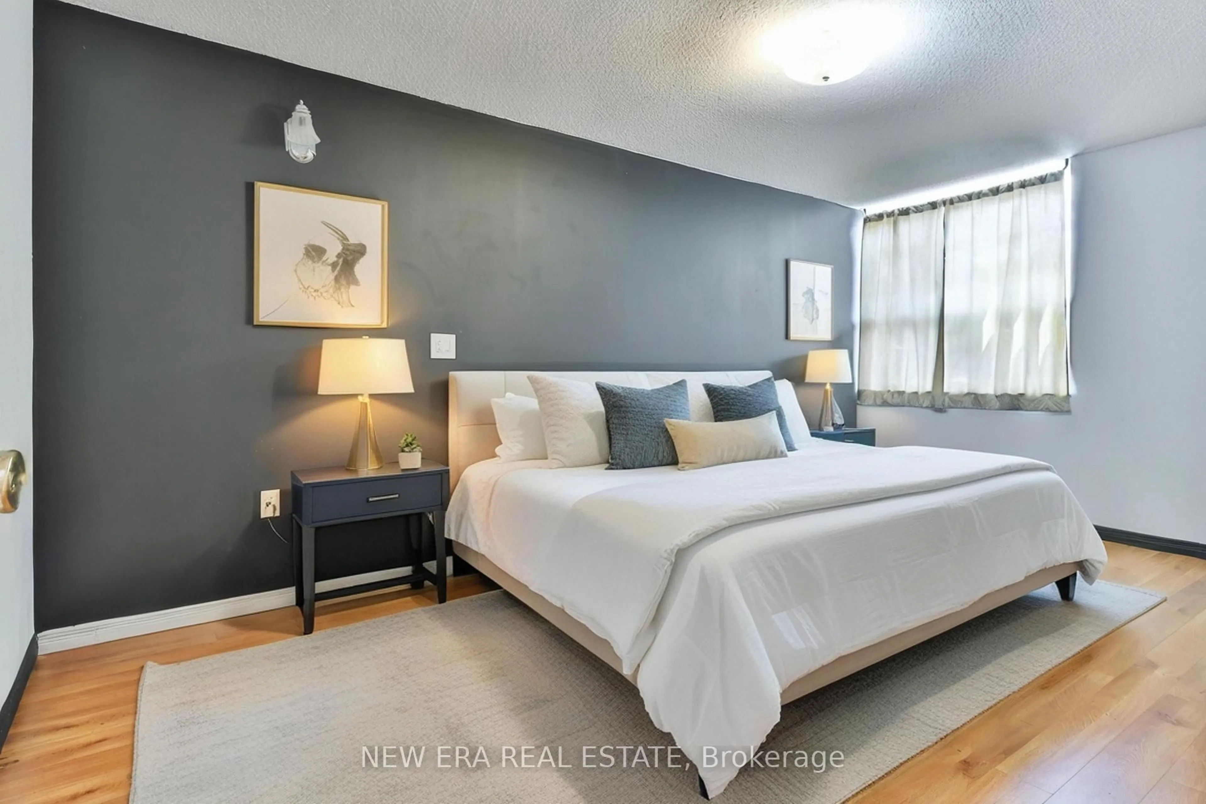 Bedroom with bed, wood/laminate floor for 4064 Lawrence Ave #602, Toronto Ontario M1E 4V6