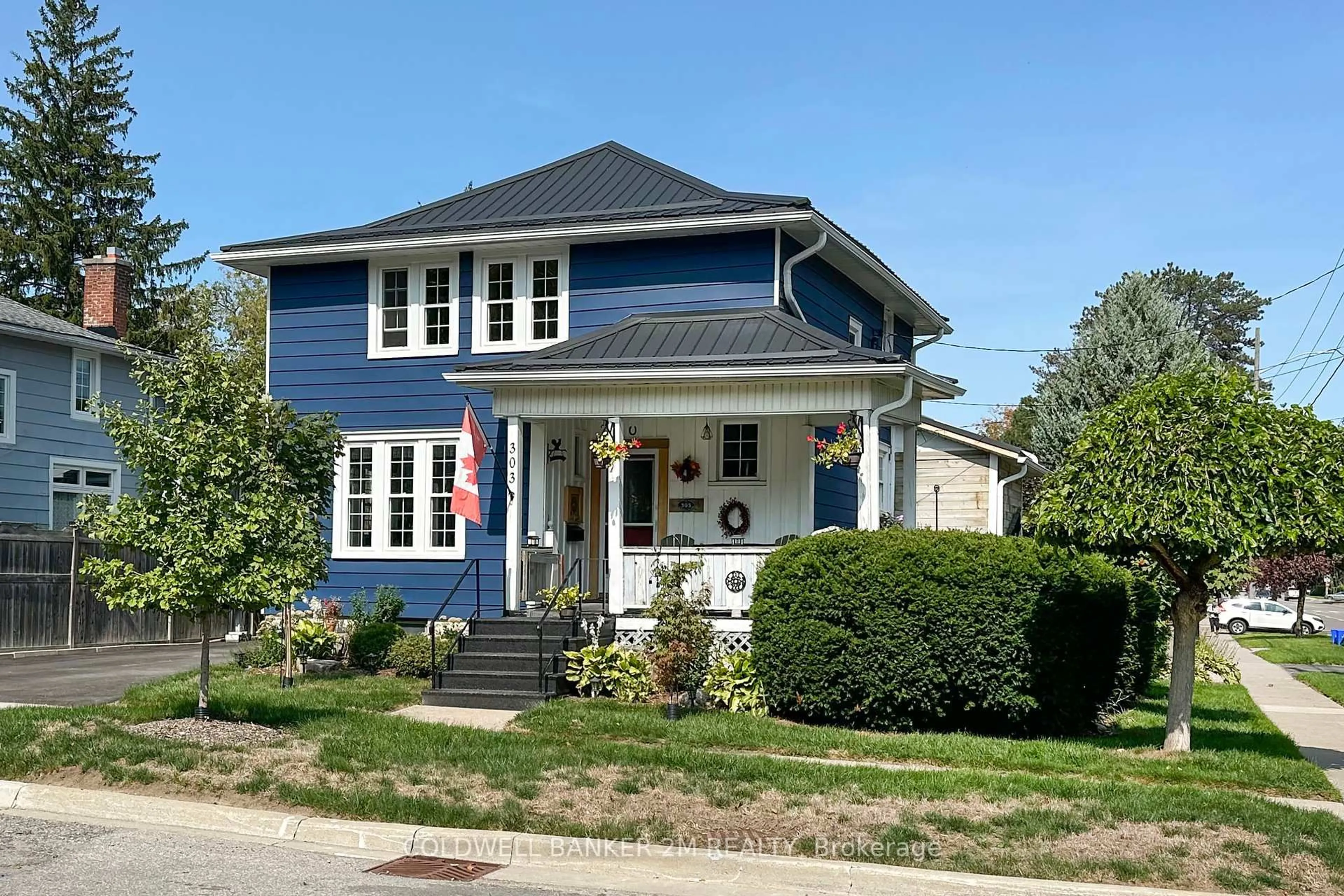Home with vinyl exterior material, street for 303 McDonald St, Scugog Ontario L9L 1L6