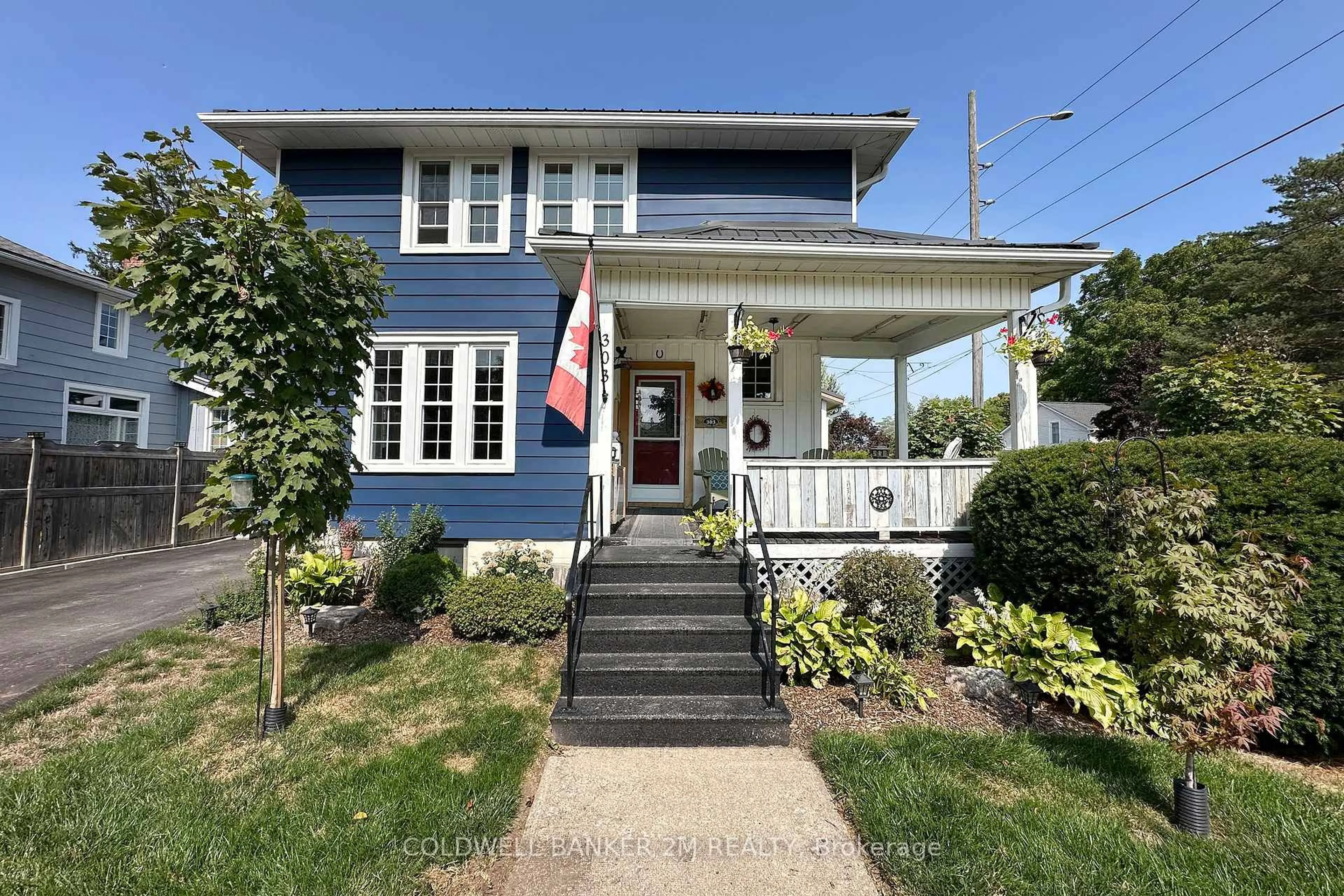 Home with vinyl exterior material, street for 303 McDonald St, Scugog Ontario L9L 1L6