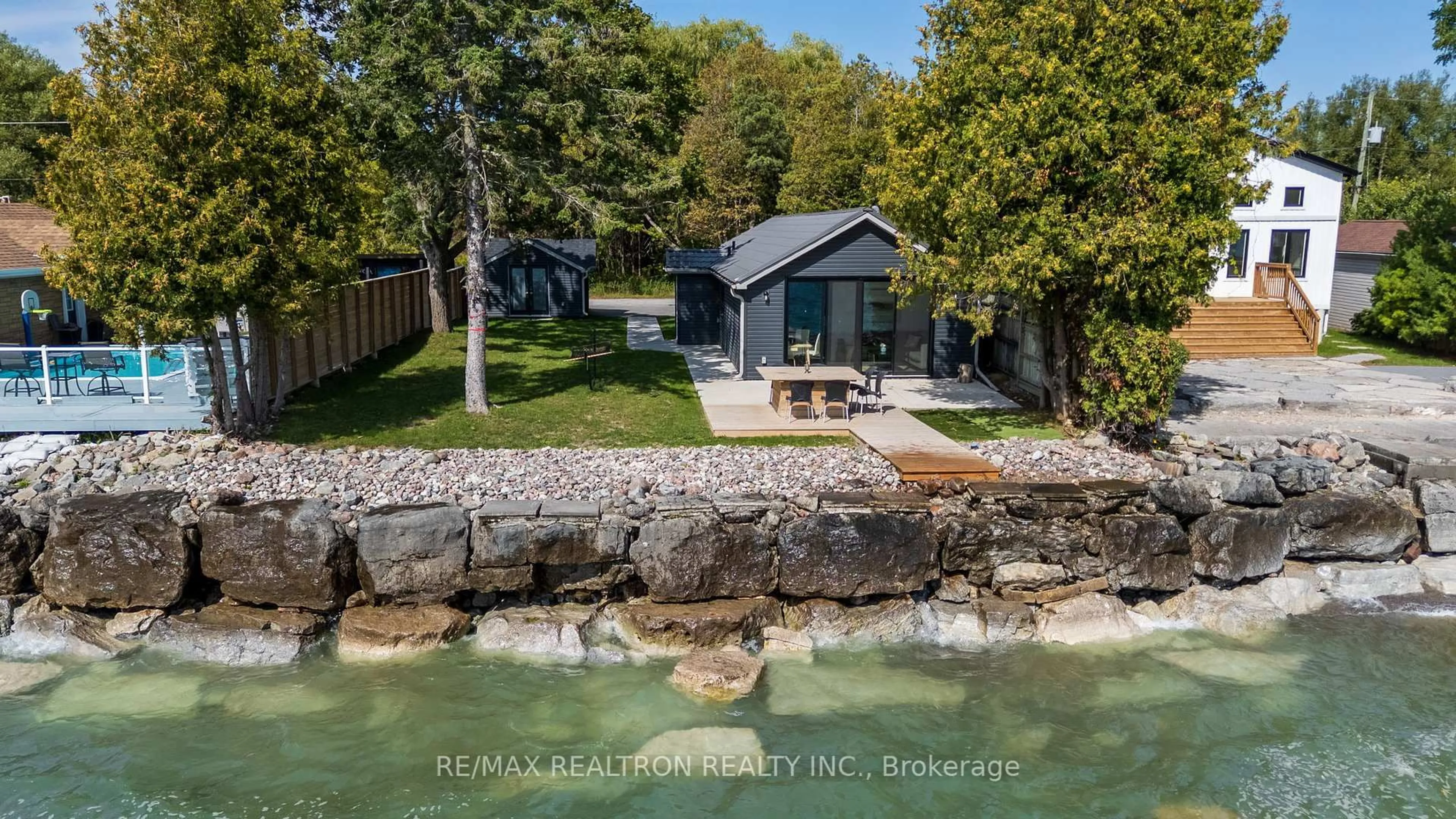 A pic from outside/outdoor area/front of a property/back of a property/a pic from drone, water/lake/river/ocean view for 63 Cedar Crest Beach Rd, Clarington Ontario L1C 3K3