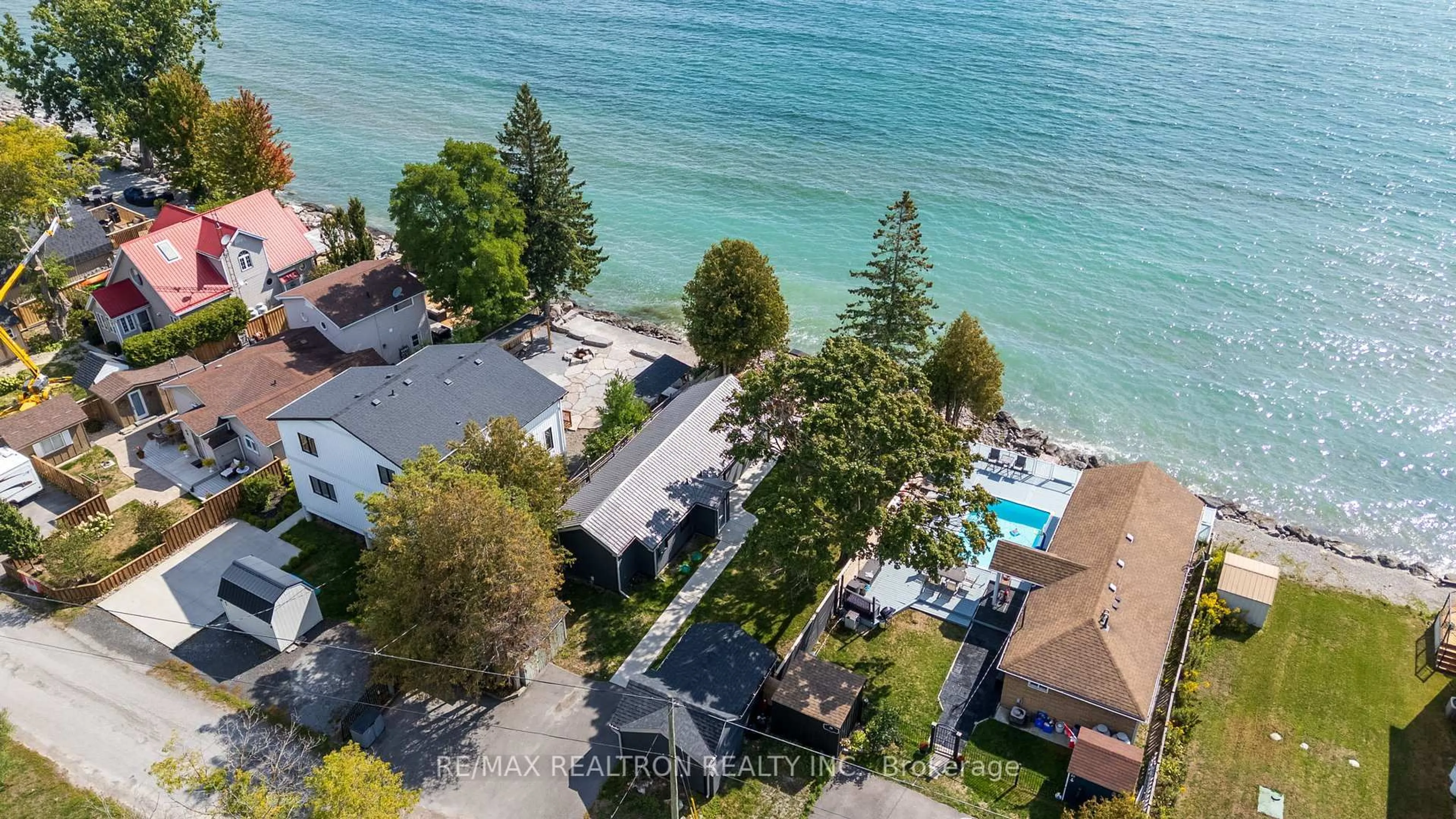 A pic from outside/outdoor area/front of a property/back of a property/a pic from drone, water/lake/river/ocean view for 63 Cedar Crest Beach Rd, Clarington Ontario L1C 3K3