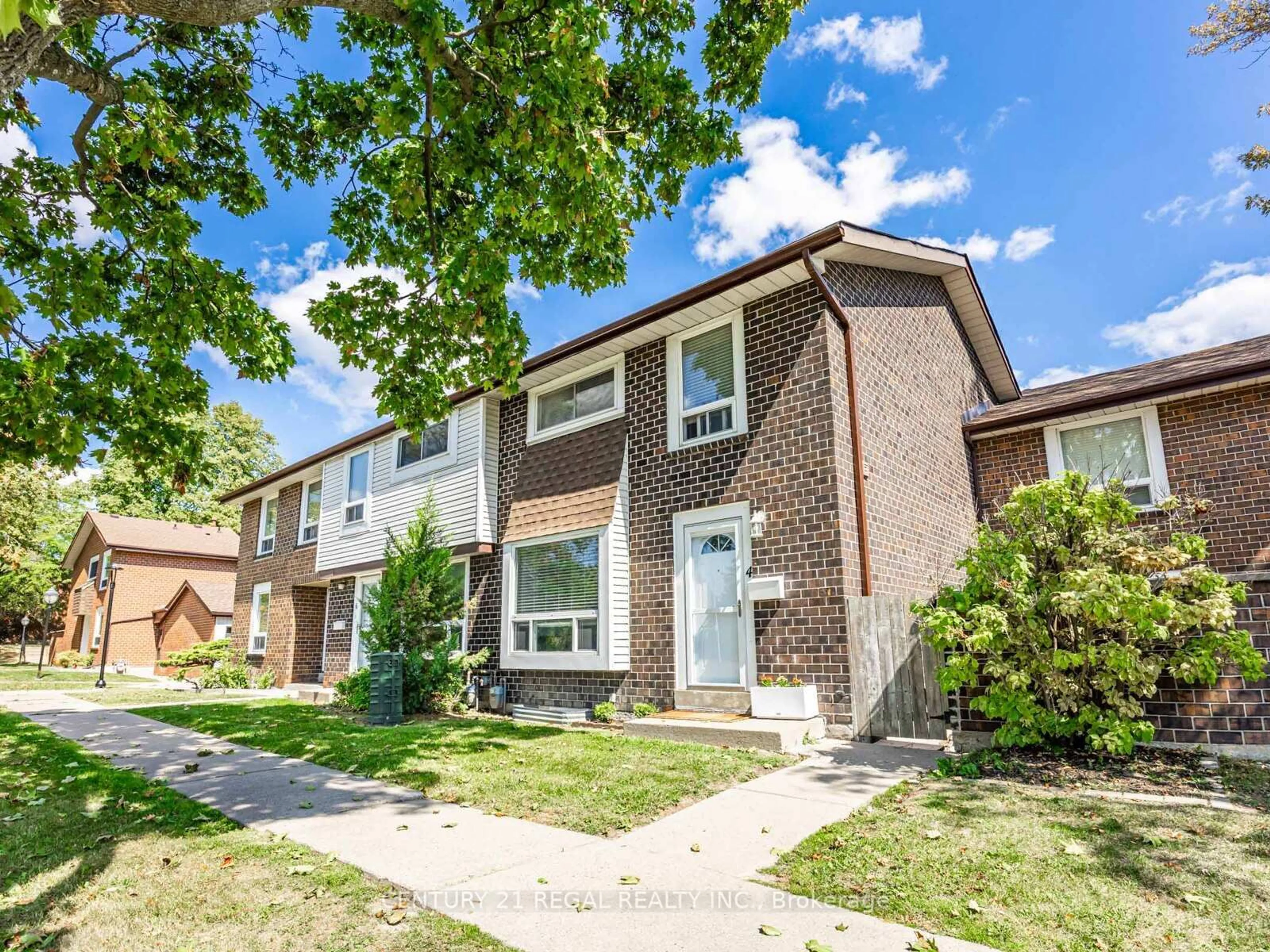 Home with brick exterior material, street for 4 Groves Lane, Ajax Ontario L1S 3C8