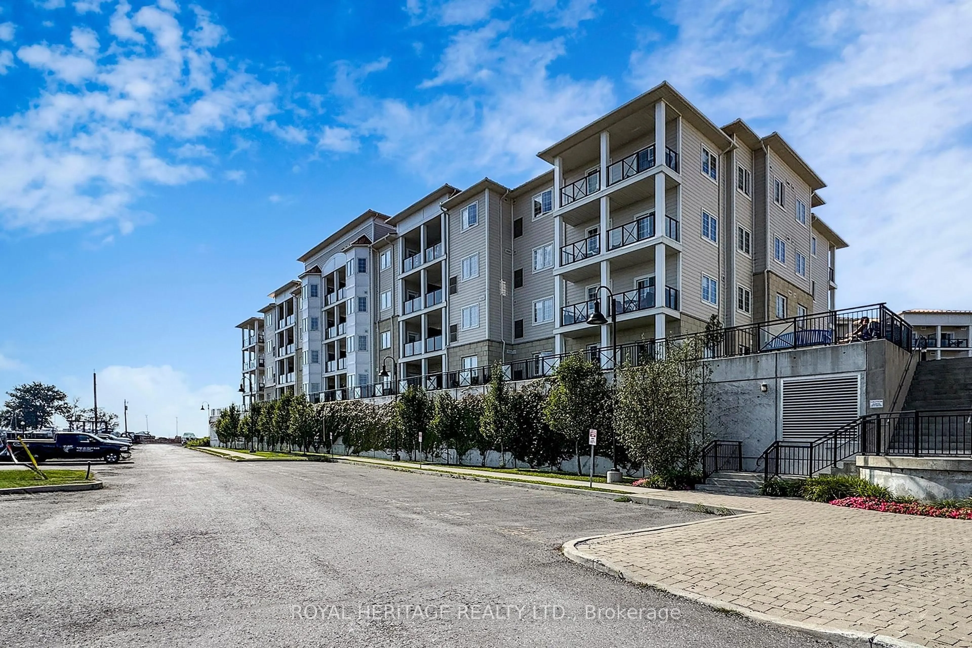 A pic from outside/outdoor area/front of a property/back of a property/a pic from drone, water/lake/river/ocean view for 70 Shipway Ave #214, Clarington Ontario L1B 0V7