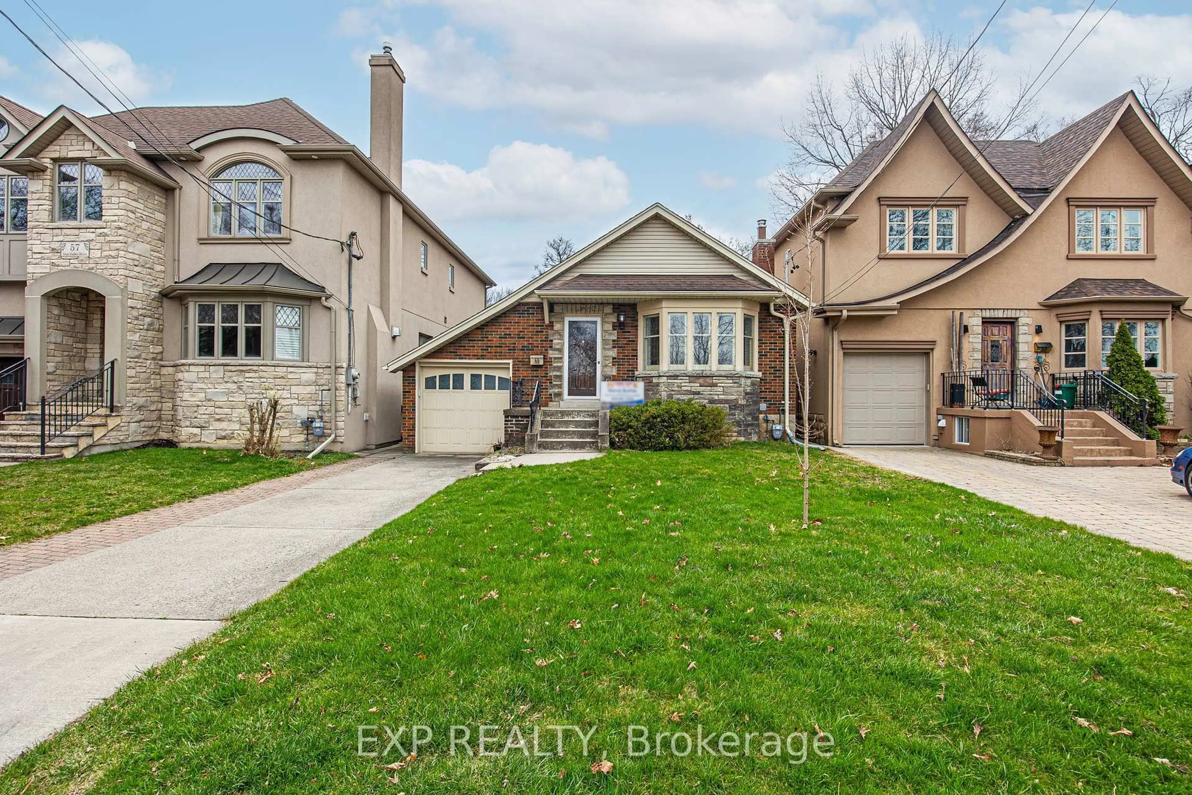 Home with brick exterior material, street for 55 Don Valley Dr, Toronto Ontario M4K 2J1