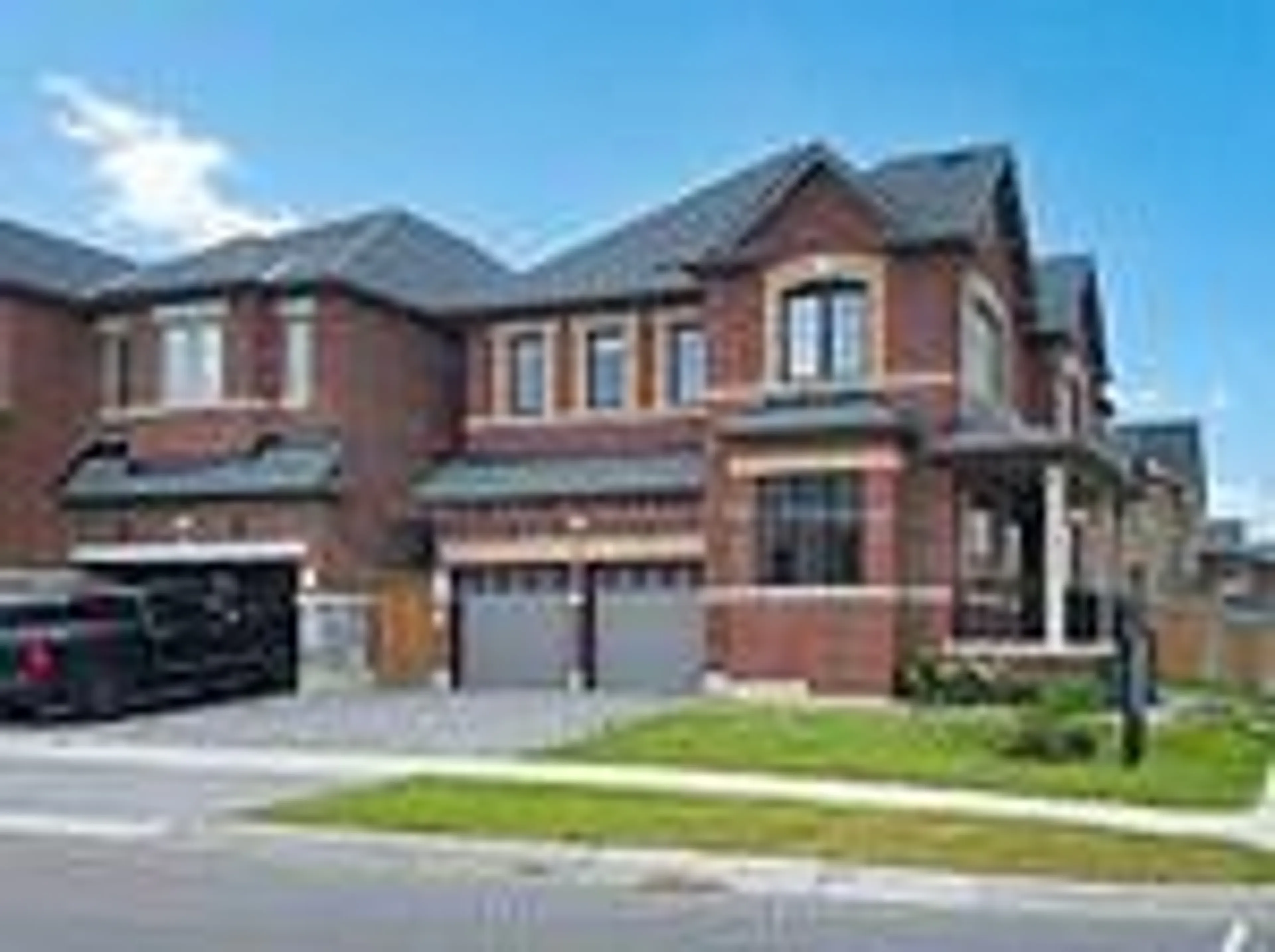 Home with brick exterior material, street for 2 Auckland Dr, Whitby Ontario L1P 0G6