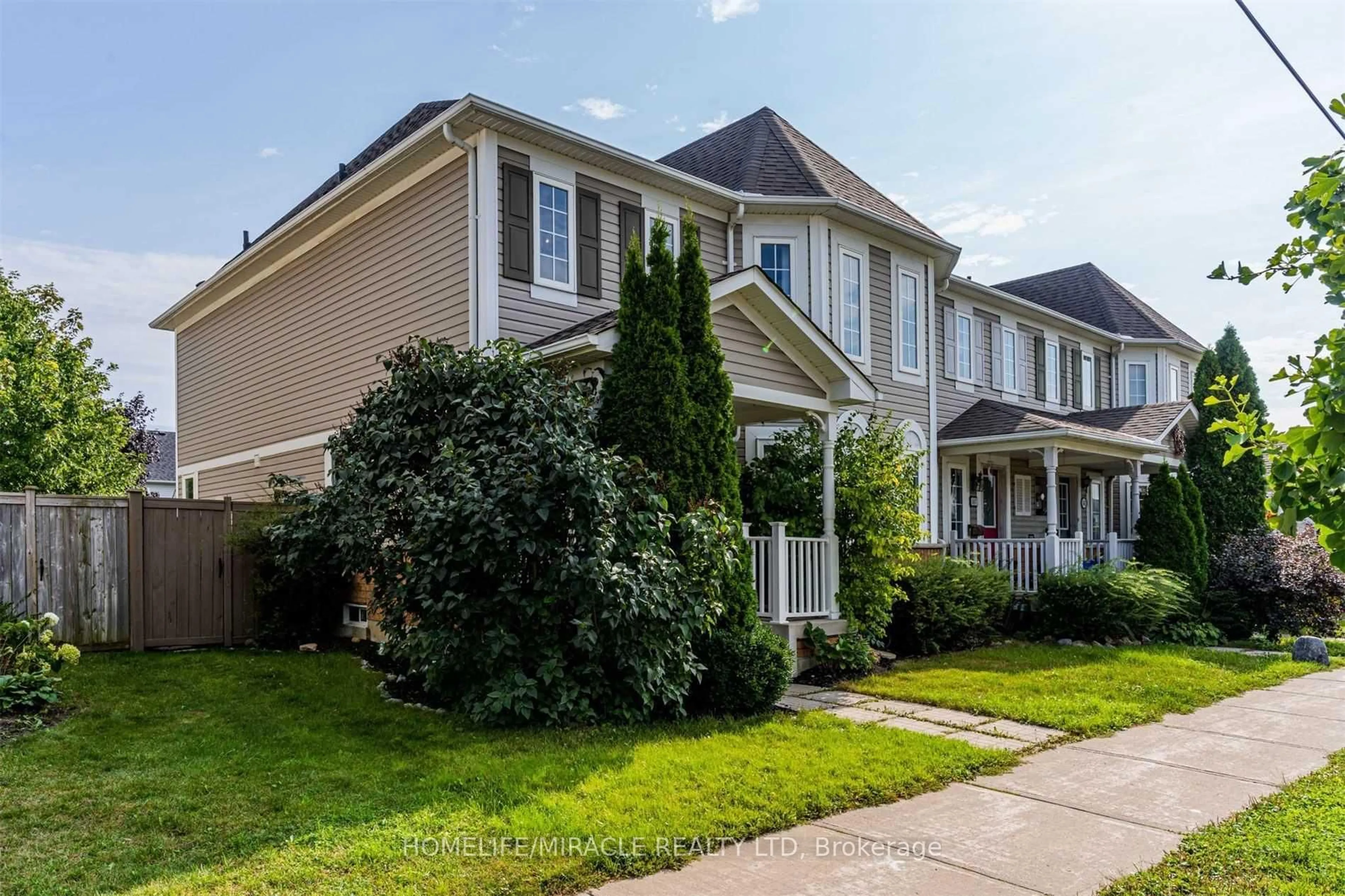 Home with vinyl exterior material, street for 149 Carnwith Dr, Whitby Ontario L1M 2J5