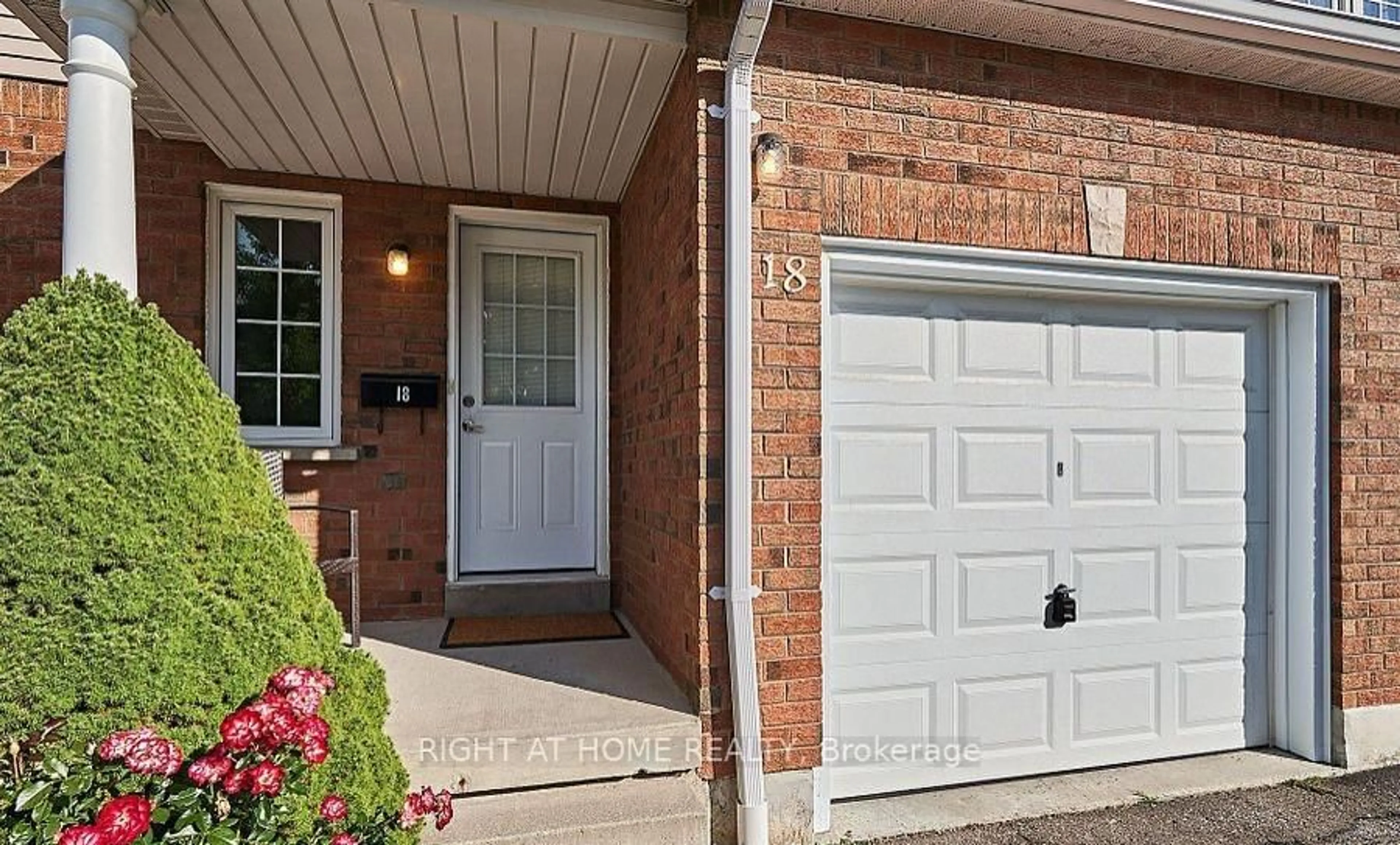 Home with brick exterior material, street for 10 Bassett Blvd #18, Whitby Ontario L1N 9C3