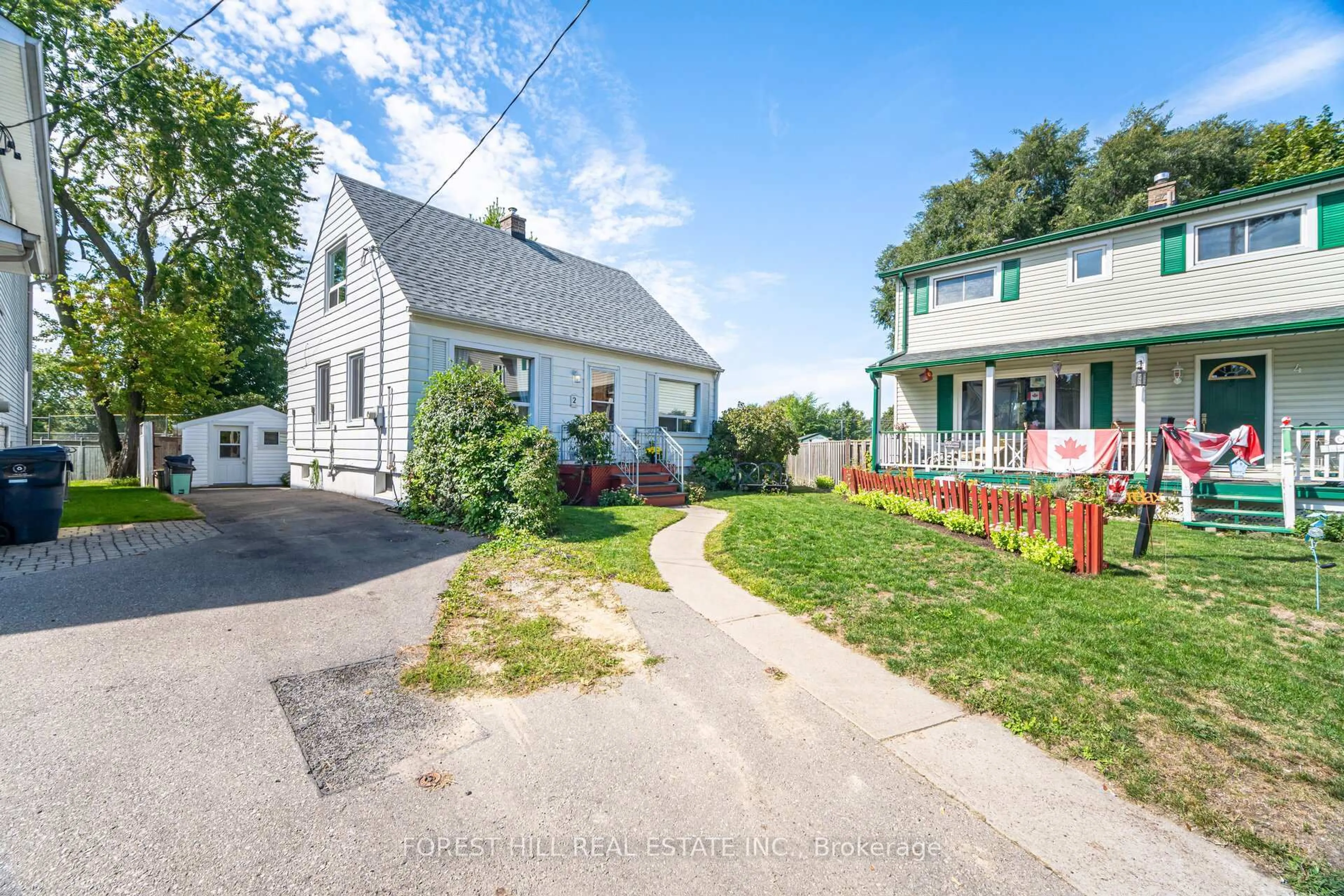 A pic from outside/outdoor area/front of a property/back of a property/a pic from drone, street for 2 Topham Rd, Toronto Ontario M4B 3K2