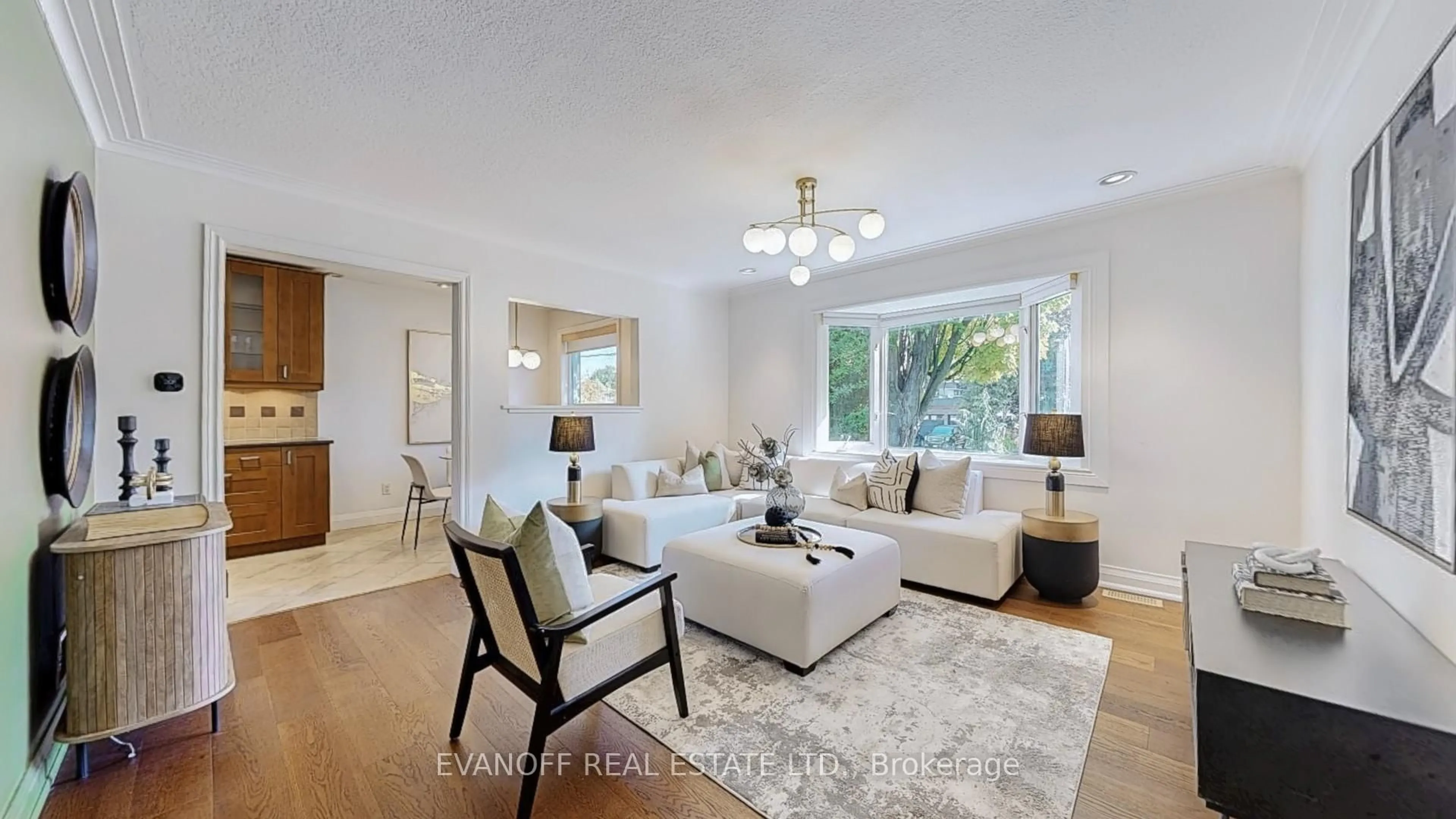 Living room with furniture, wood/laminate floor for 46 Mcnab Blvd, Toronto Ontario M1M 2W5