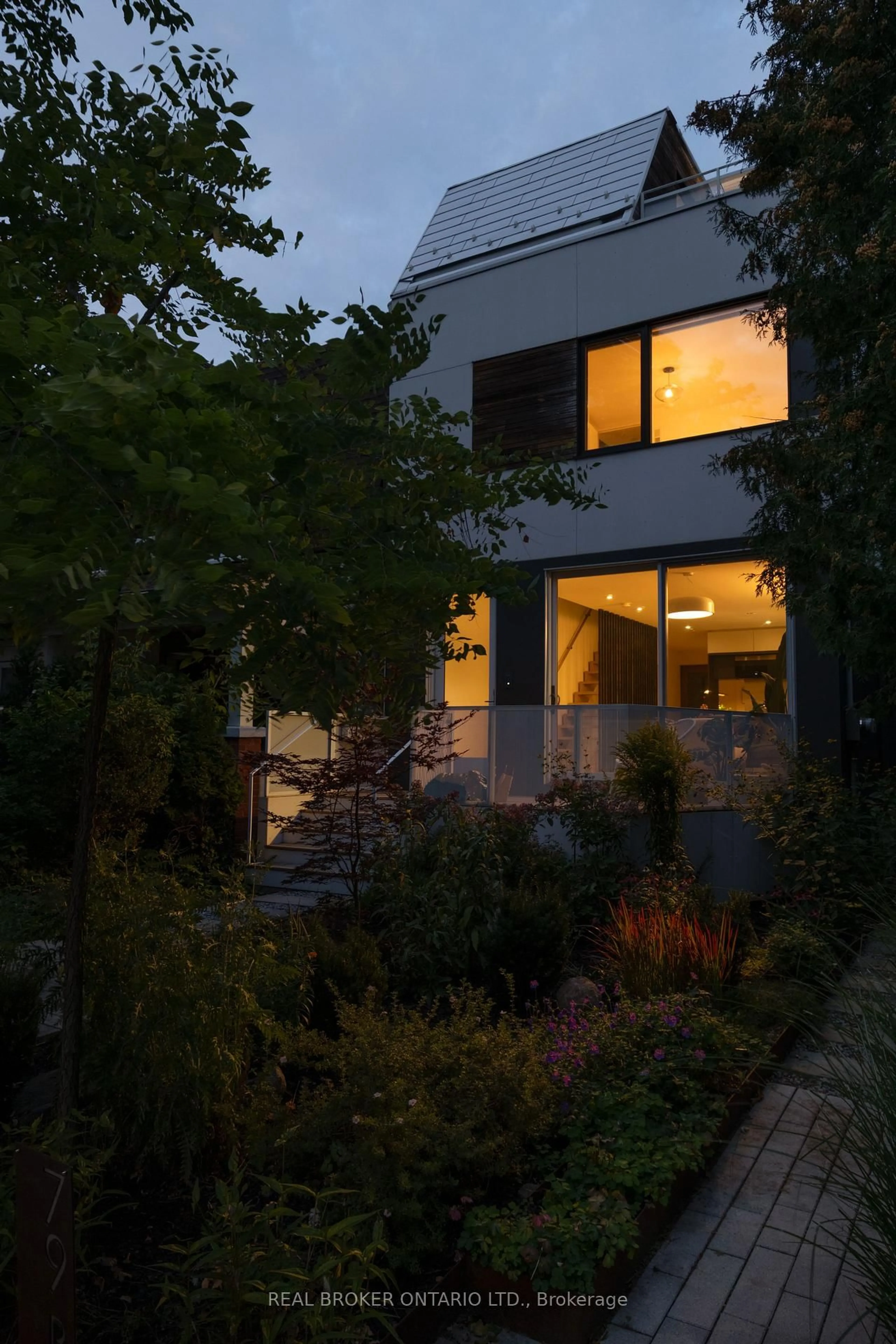 Home with brick exterior material, street for 79 Eaton Ave #A, Toronto Ontario M4J 2Z4