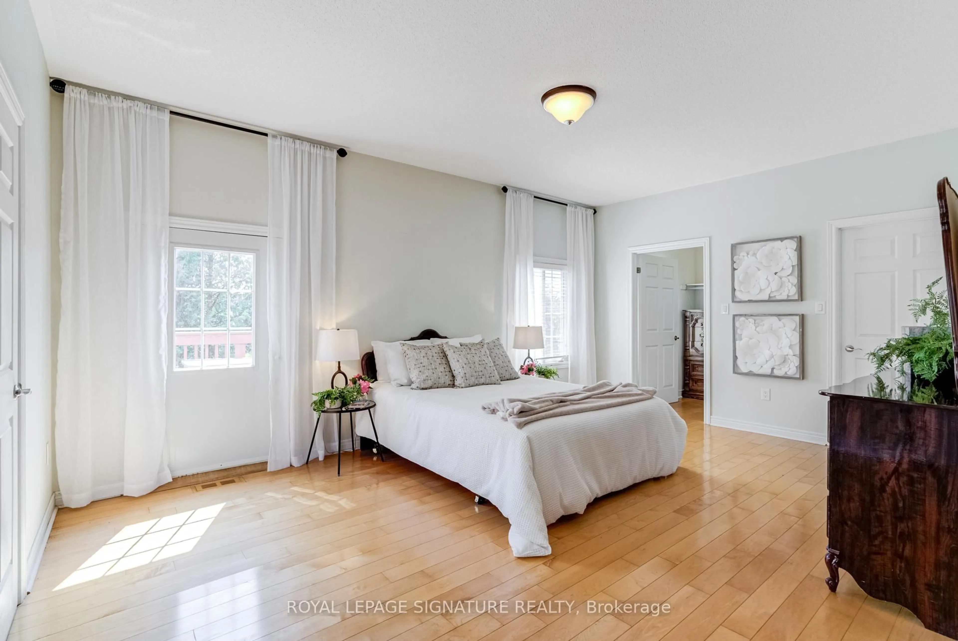 Bedroom with bed, wood/laminate floor for 19 Driscoll Dr, Ajax Ontario L1T 0J1