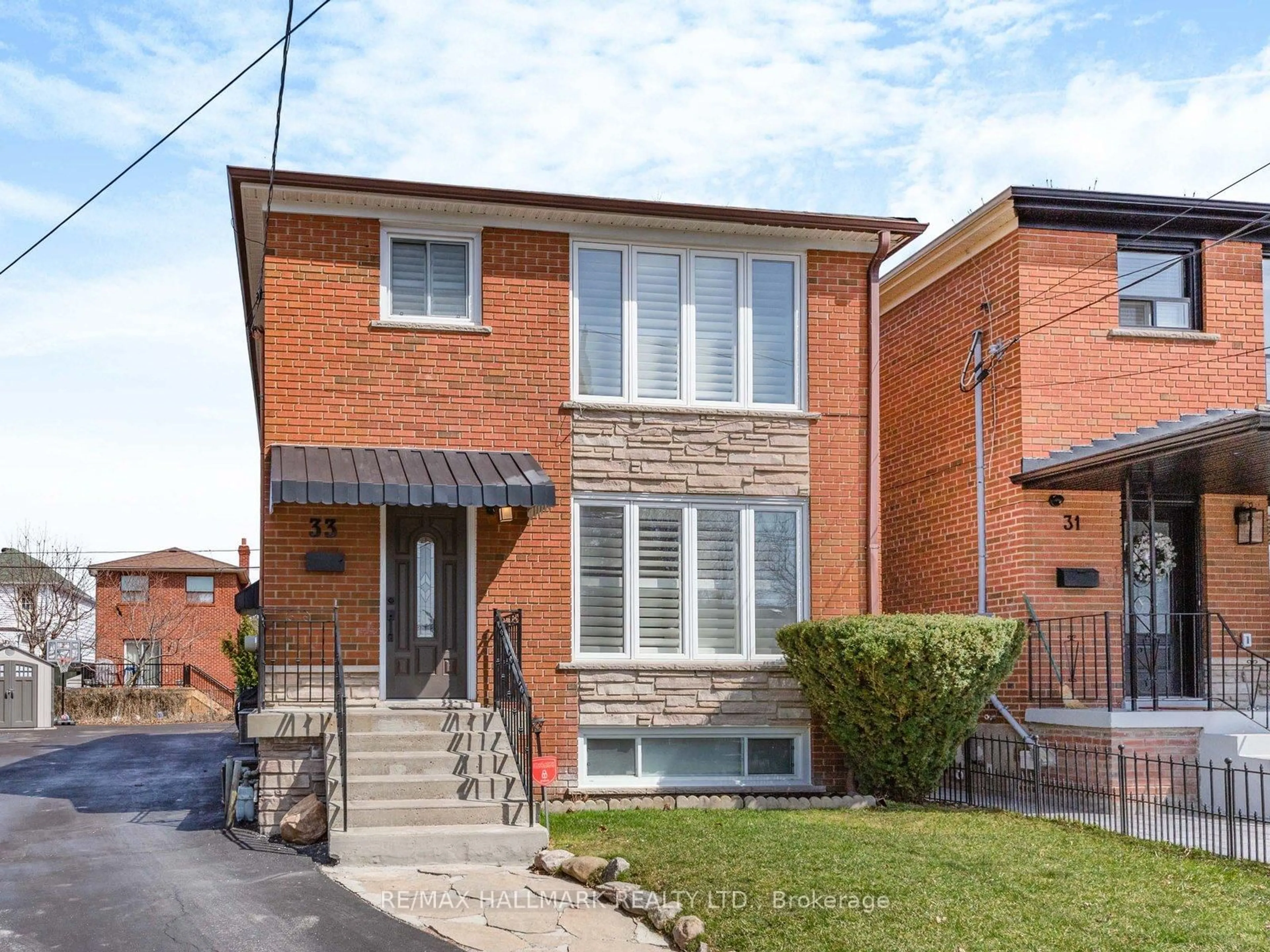 Home with brick exterior material, street for 33 Everett Cres, Toronto Ontario M4C 4P4