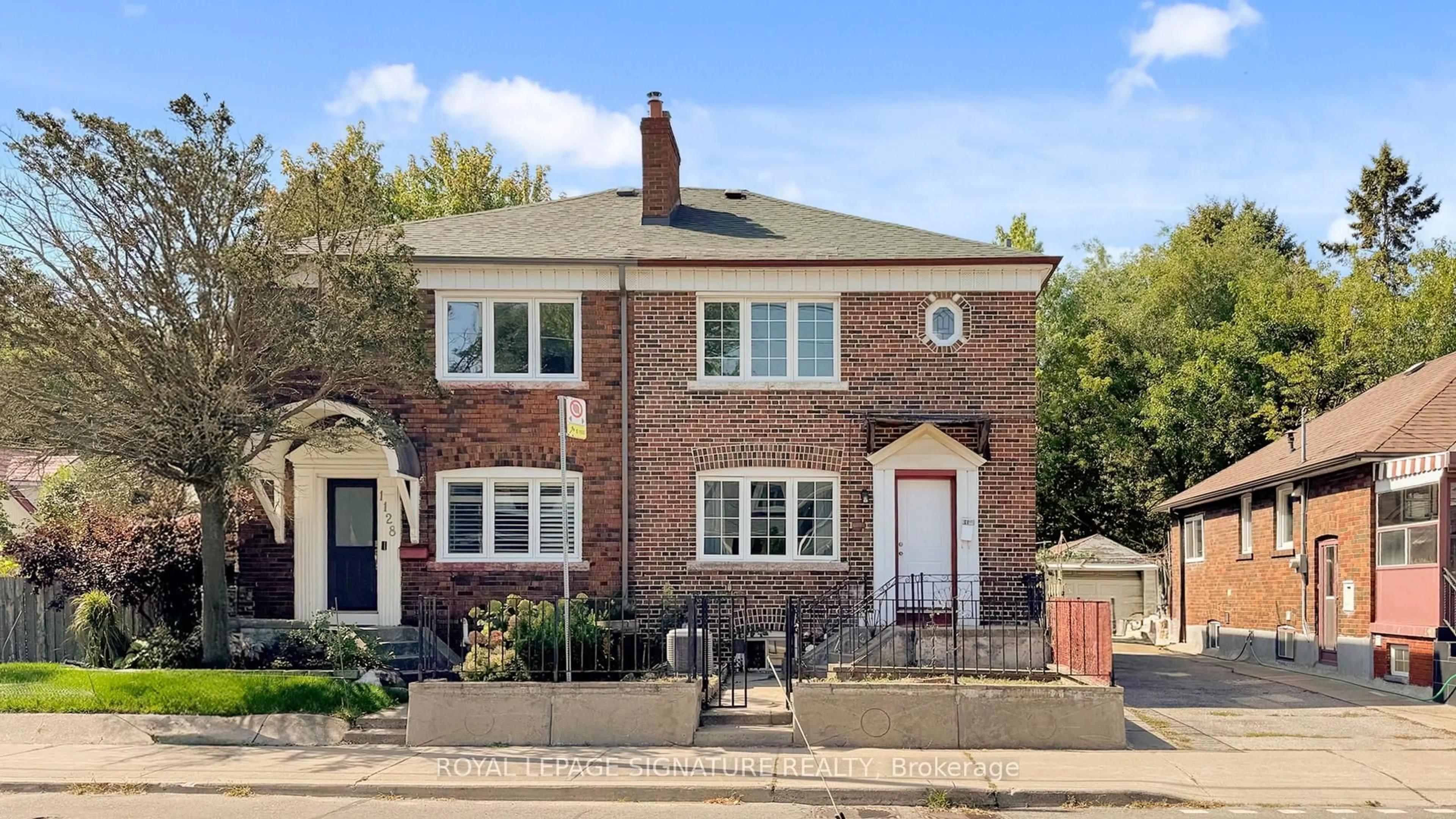 Home with brick exterior material, street for 1130 Woodbine Ave, Toronto Ontario M4C 4C8