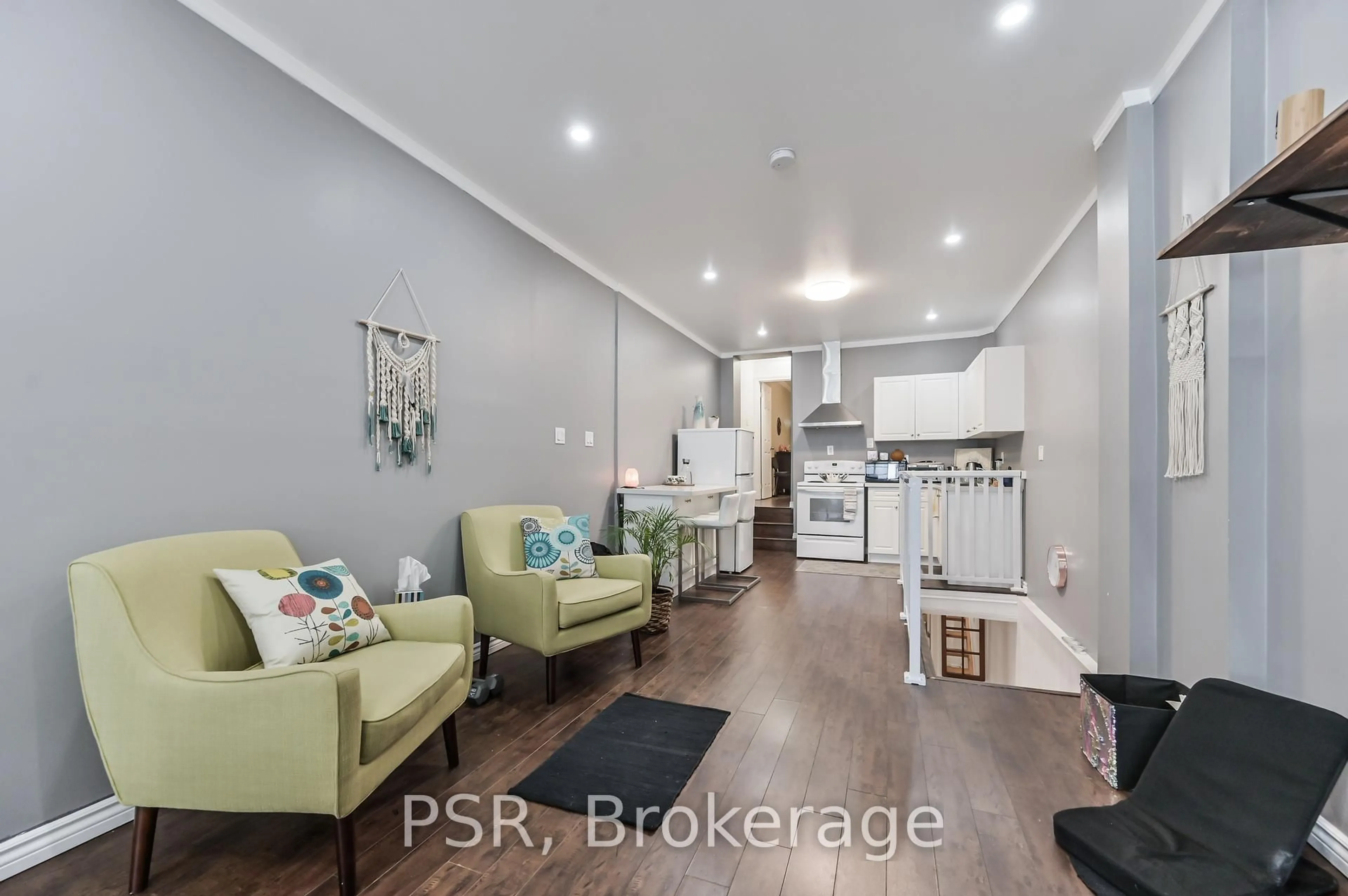 Open concept kitchen, wood/laminate floor for 640 Pape Ave, Toronto Ontario M4K 3S3