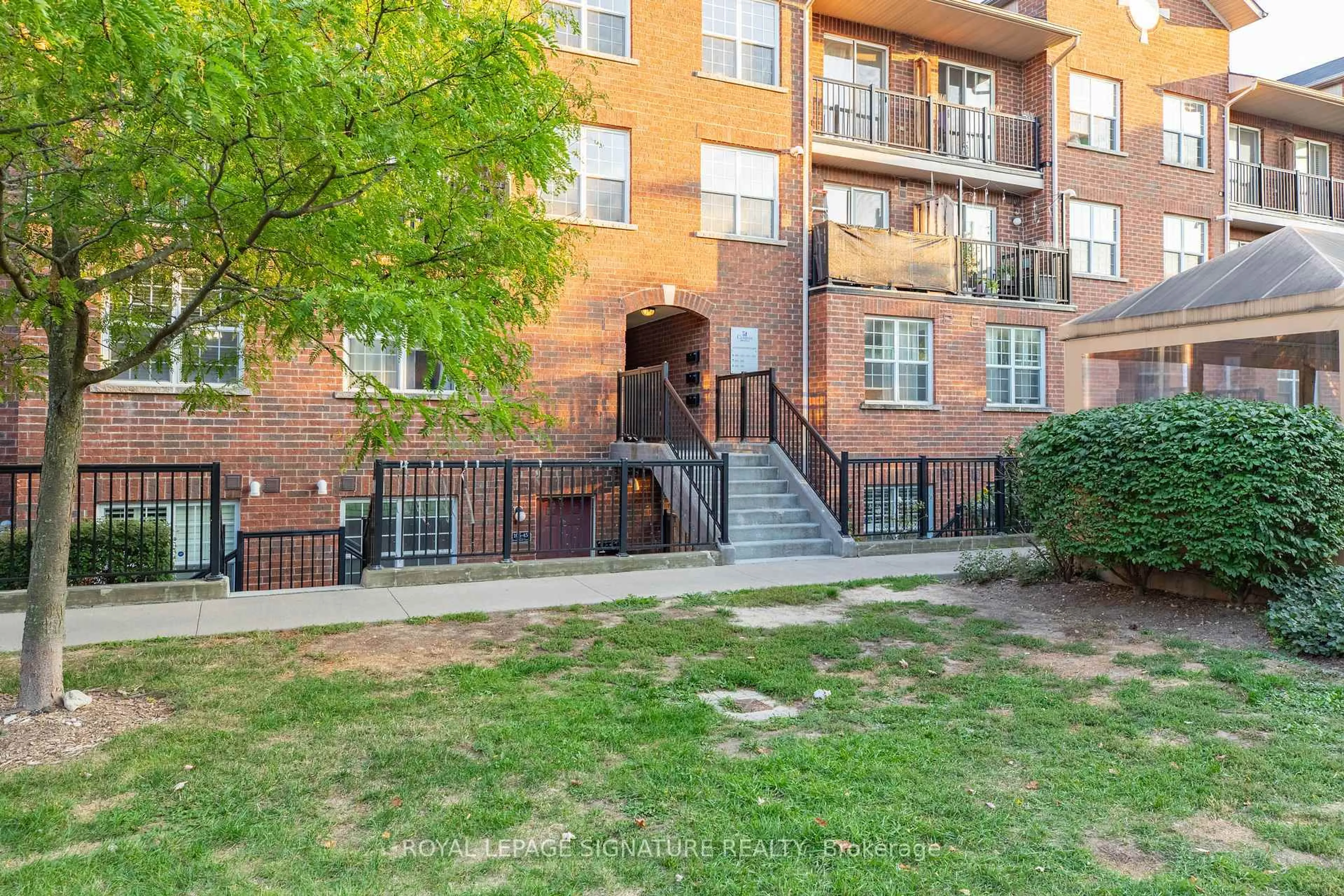 Patio, street for 45 Strangford Lane #309, Toronto Ontario M1L 0E5