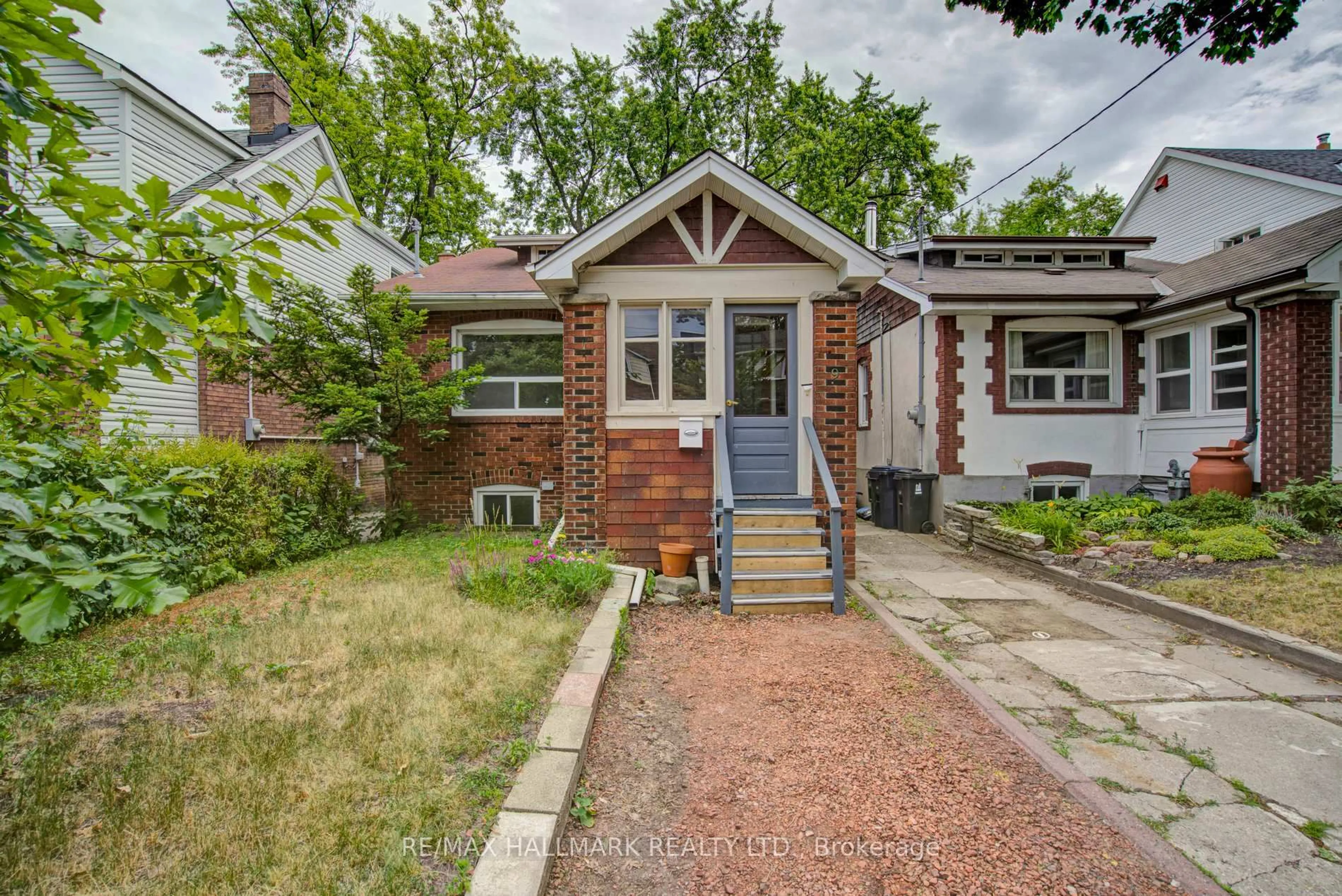 Home with brick exterior material, street for 9 Costain Ave, Toronto Ontario M4E 2G7
