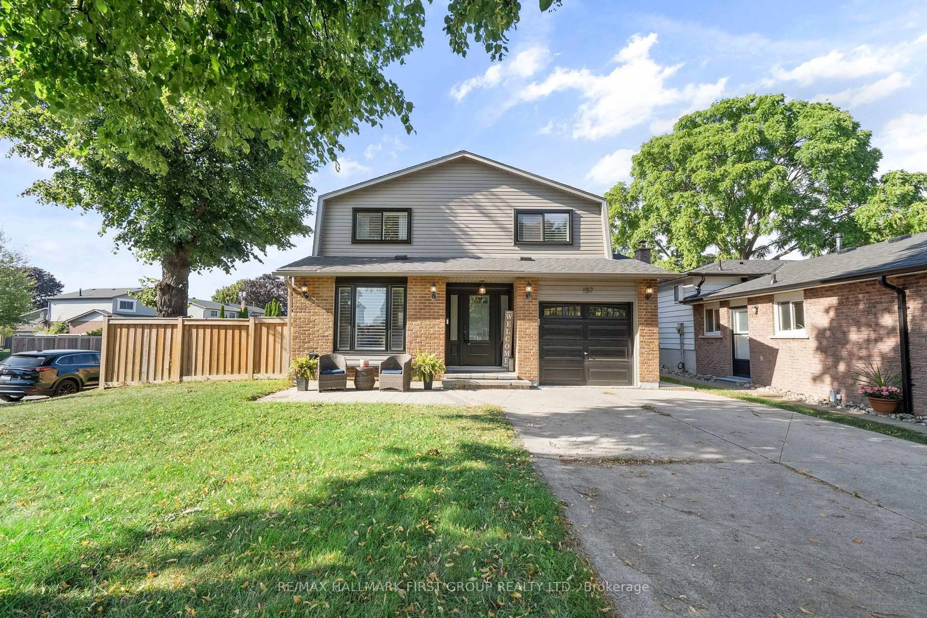 Home with brick exterior material, street for 157 Michael Blvd, Whitby Ontario L1N 5W4