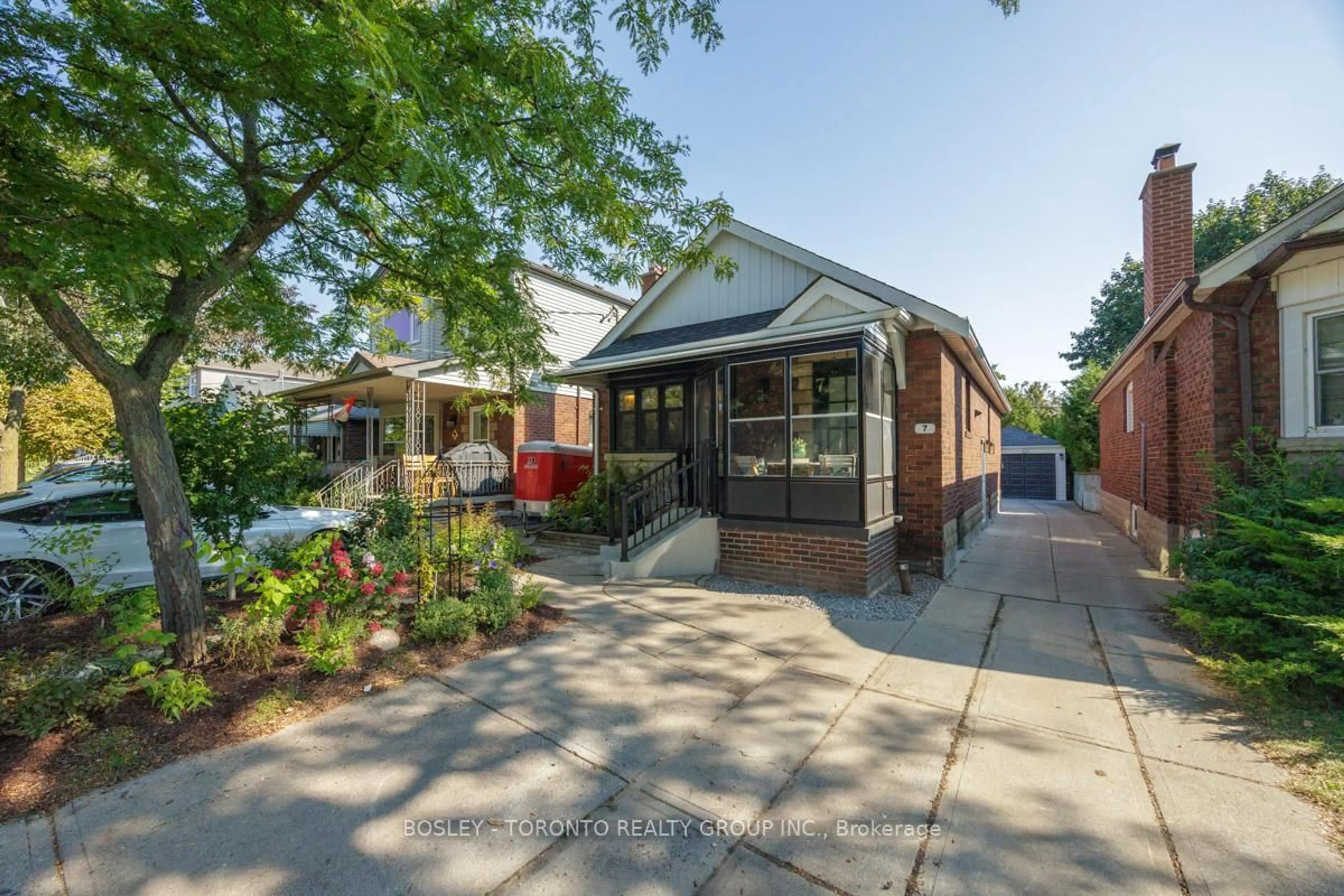 Home with brick exterior material, street for 7 Crestland Ave, Toronto Ontario M4C 3K9