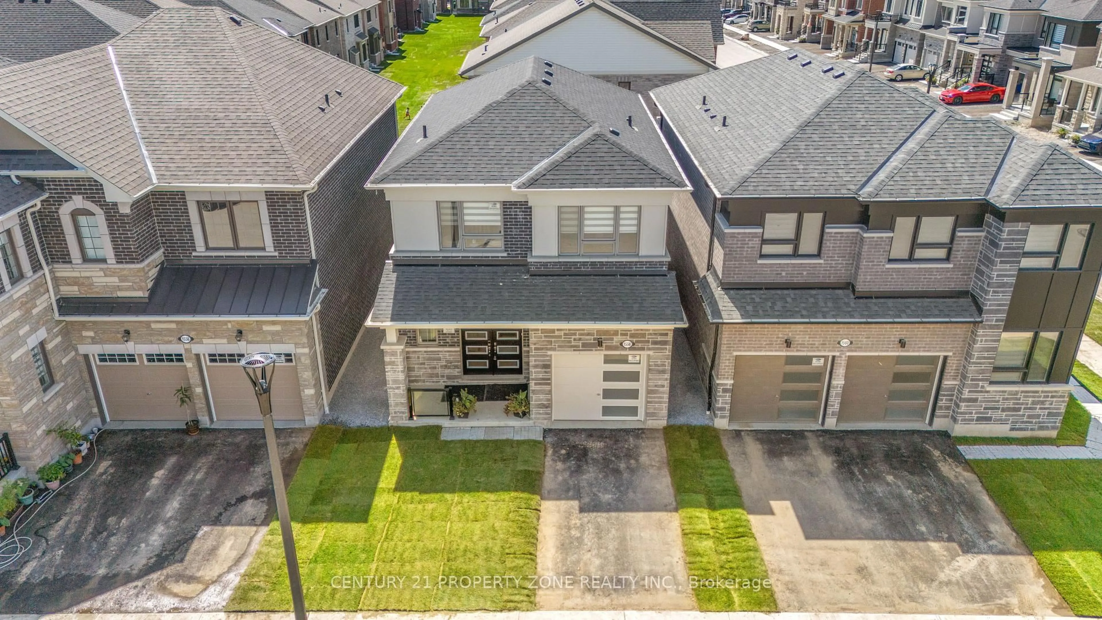 A pic from outside/outdoor area/front of a property/back of a property/a pic from drone, street for 1558 Scarlett Tr, Pickering Ontario L1X 0N9