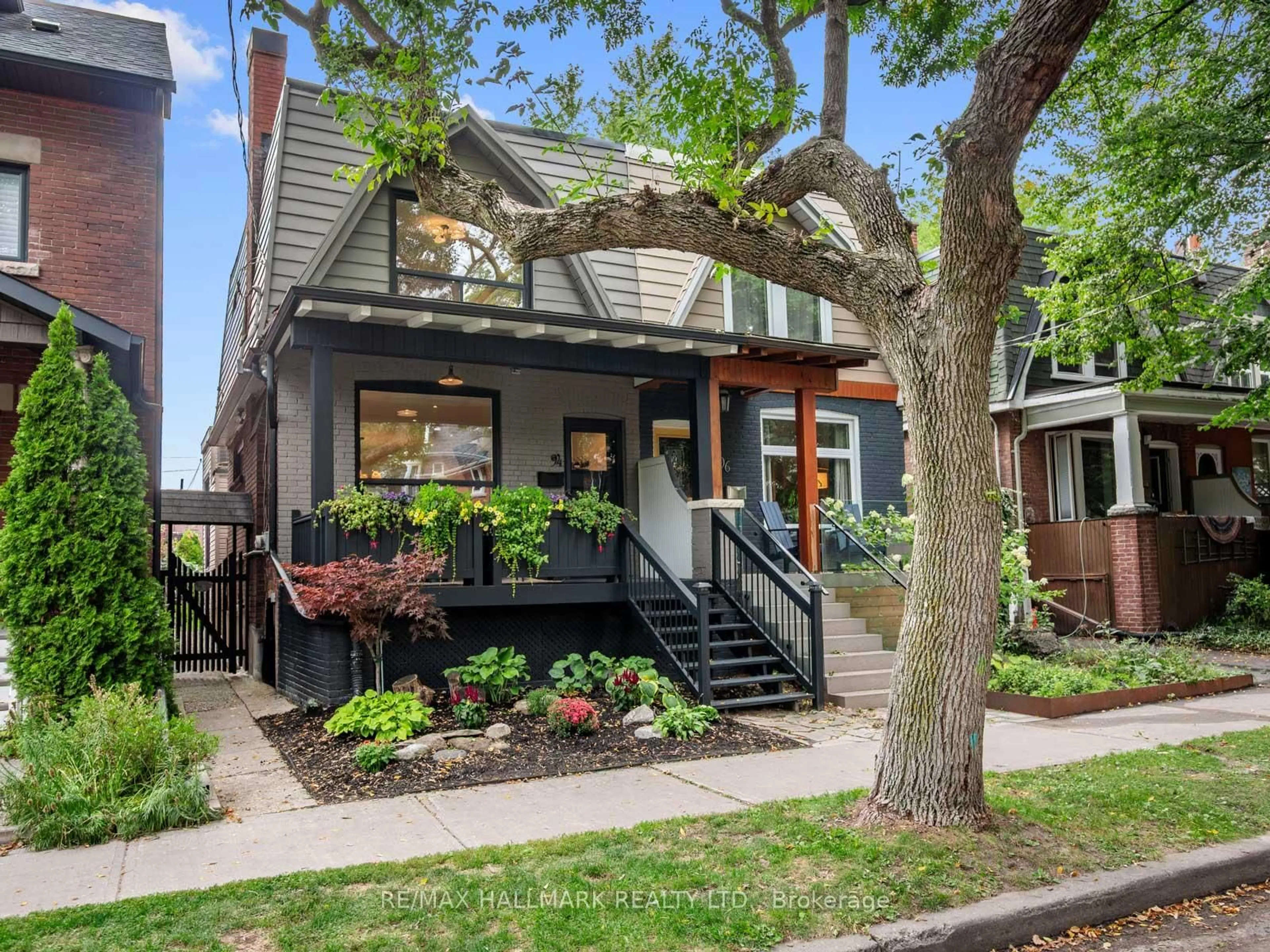 Home with brick exterior material, street for 94 Langford Ave, Toronto Ontario M4J 3E3
