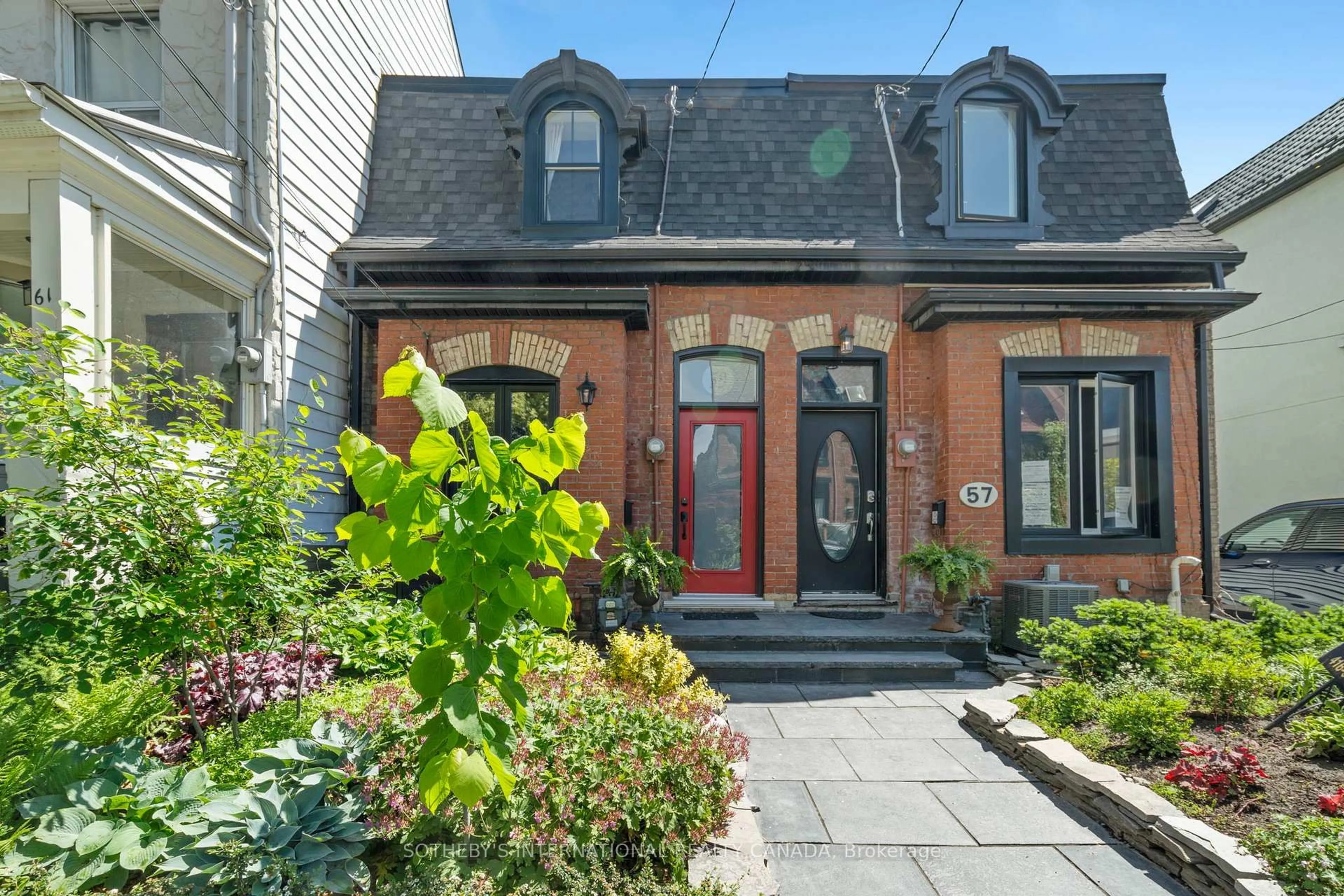 Home with brick exterior material, street for 59 De Grassi St, Toronto Ontario M4M 2K5