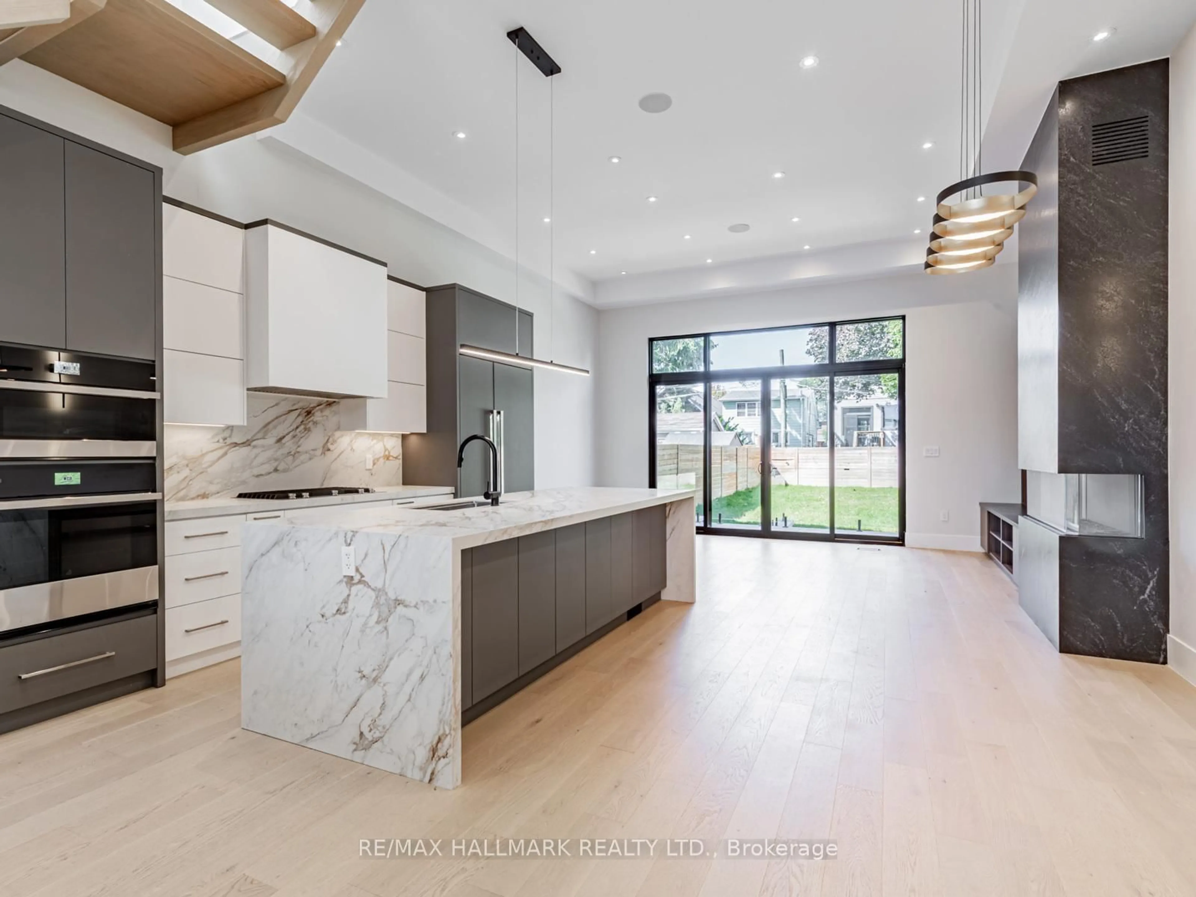 Open concept kitchen, ceramic/tile floor for 80 Barker Ave, Toronto Ontario M4C 2N6