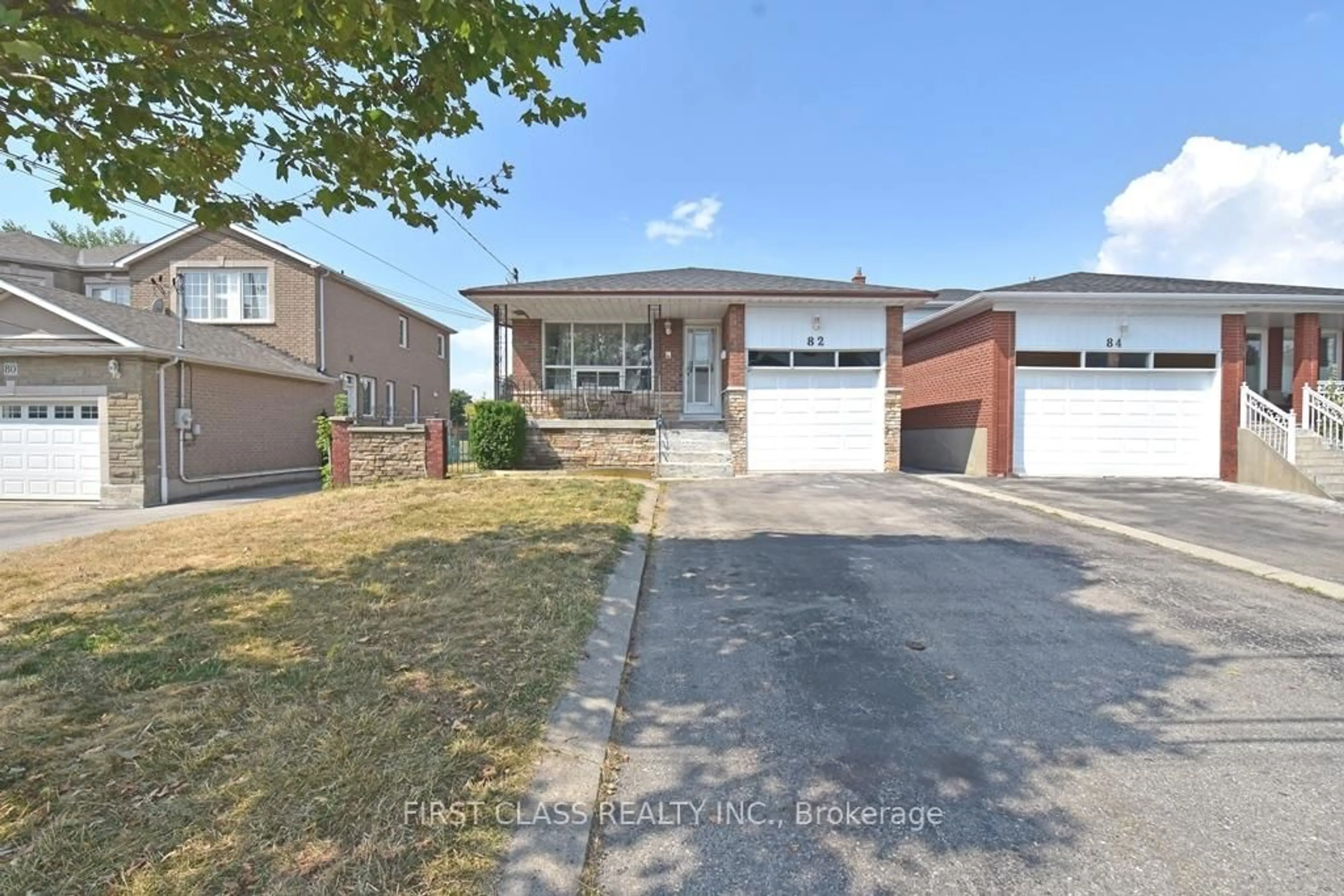 Home with brick exterior material, street for 82 Gooderham Dr, Toronto Ontario M1R 3G7
