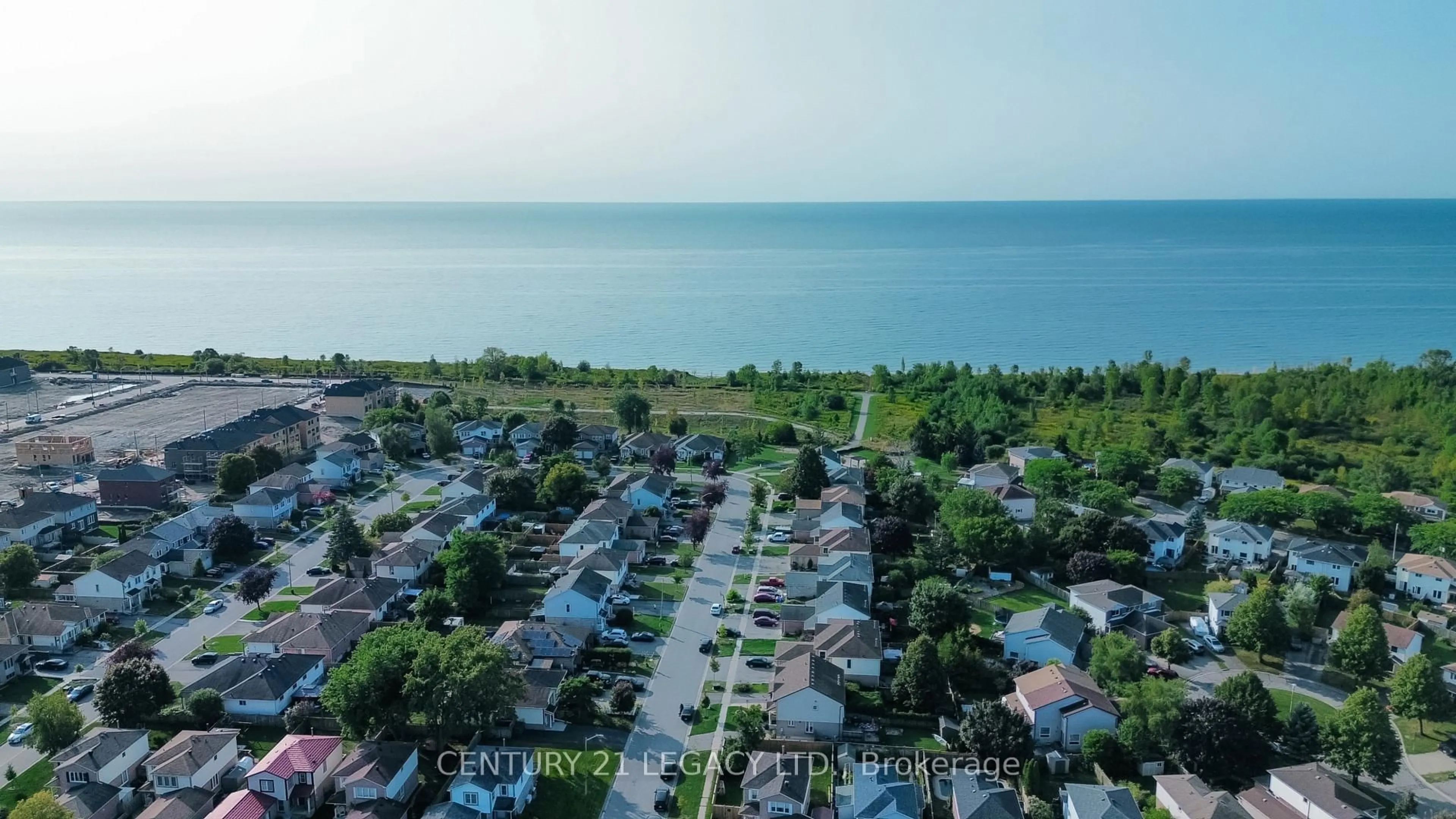 A pic from outside/outdoor area/front of a property/back of a property/a pic from drone, water/lake/river/ocean view for 1544 Connery Cres, Oshawa Ontario L1J 8G1