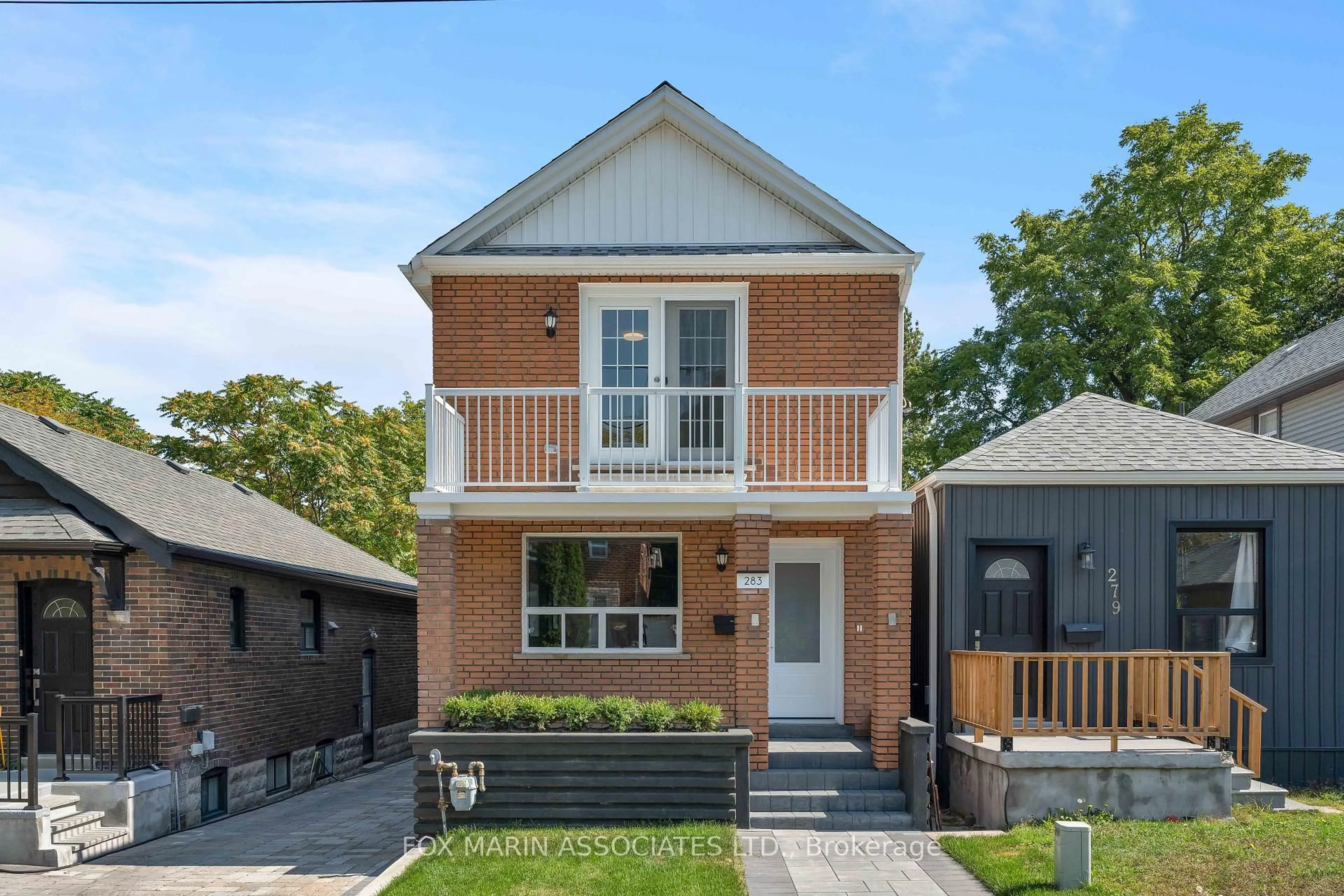 Home with brick exterior material, street for 283 Cedarvale Ave, Toronto Ontario M4C 4K3