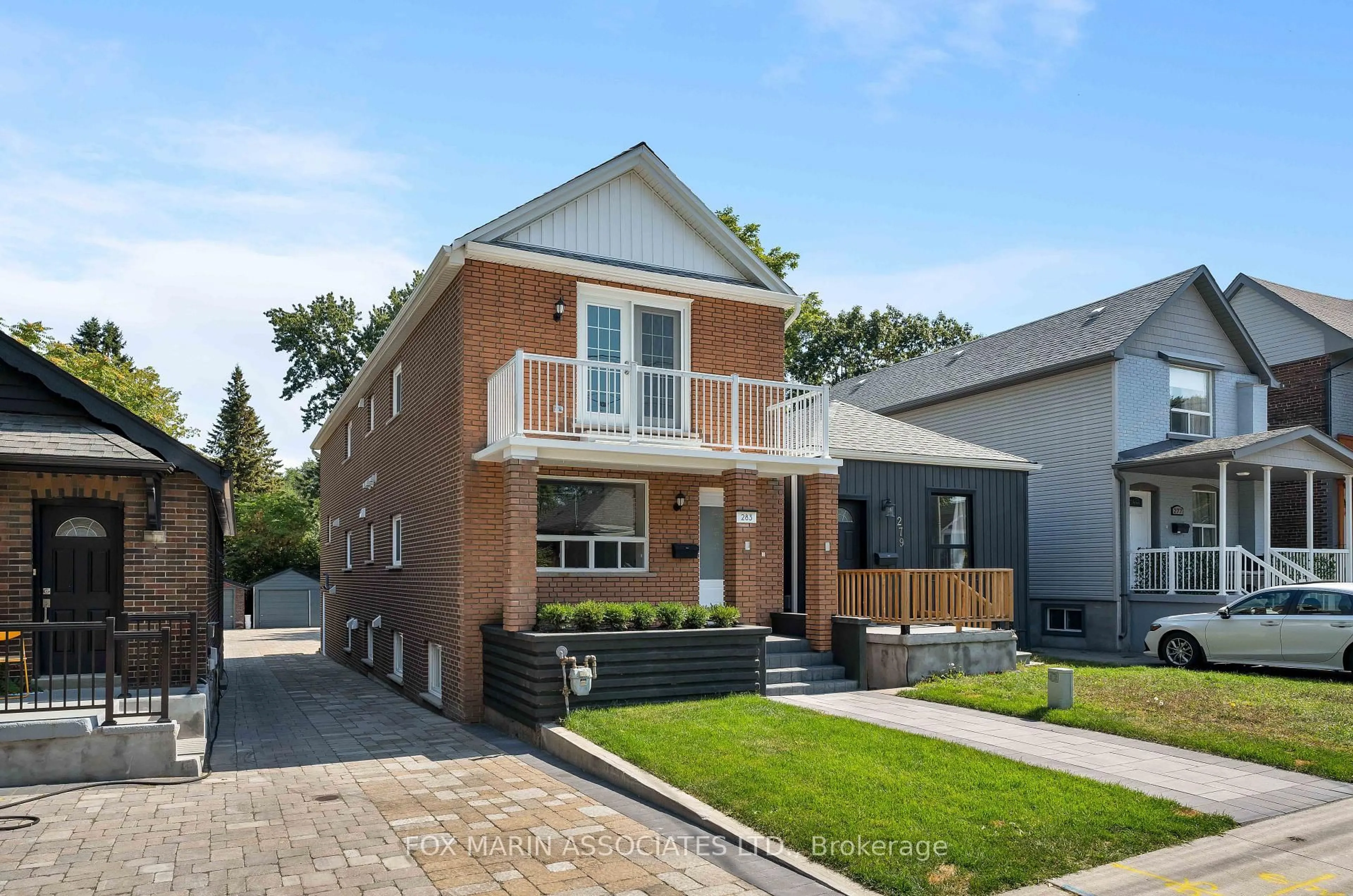 Home with brick exterior material, street for 283 Cedarvale Ave, Toronto Ontario M4C 4K3