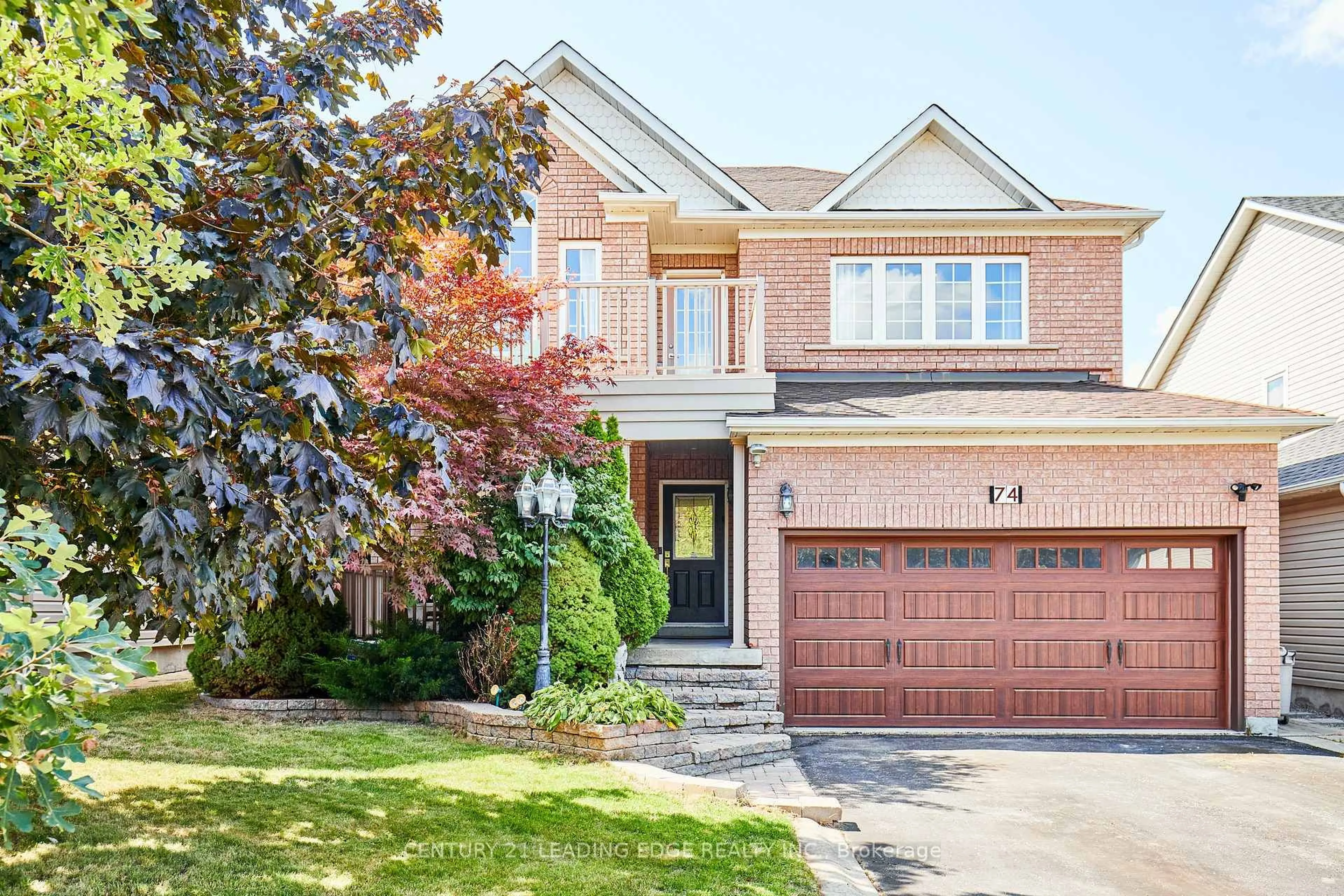 Home with brick exterior material, street for 74 Darius Harns Dr, Whitby Ontario L1M 2G7