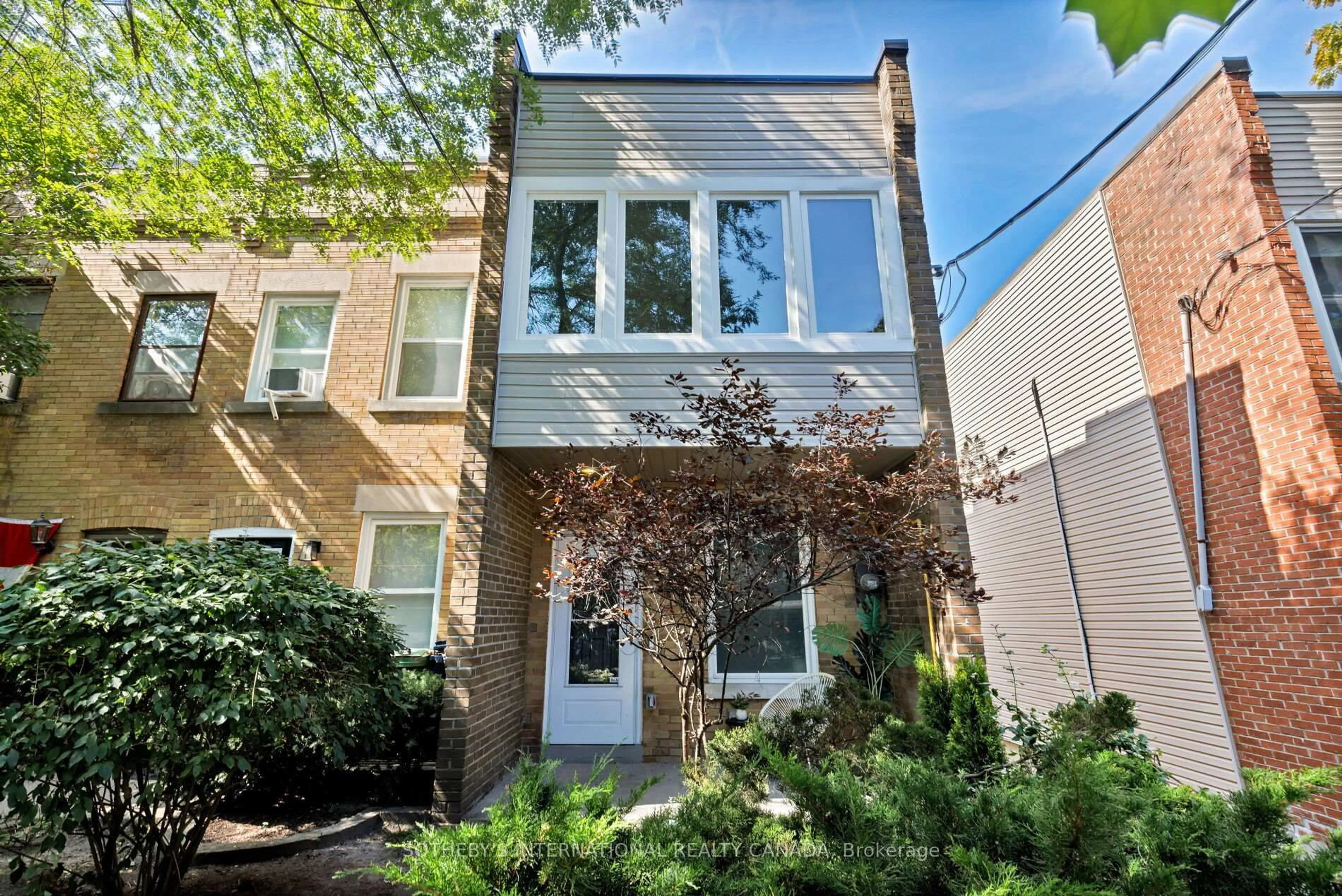 Home with brick exterior material, street for 234 Waverley Rd, Toronto Ontario M4L 3T3