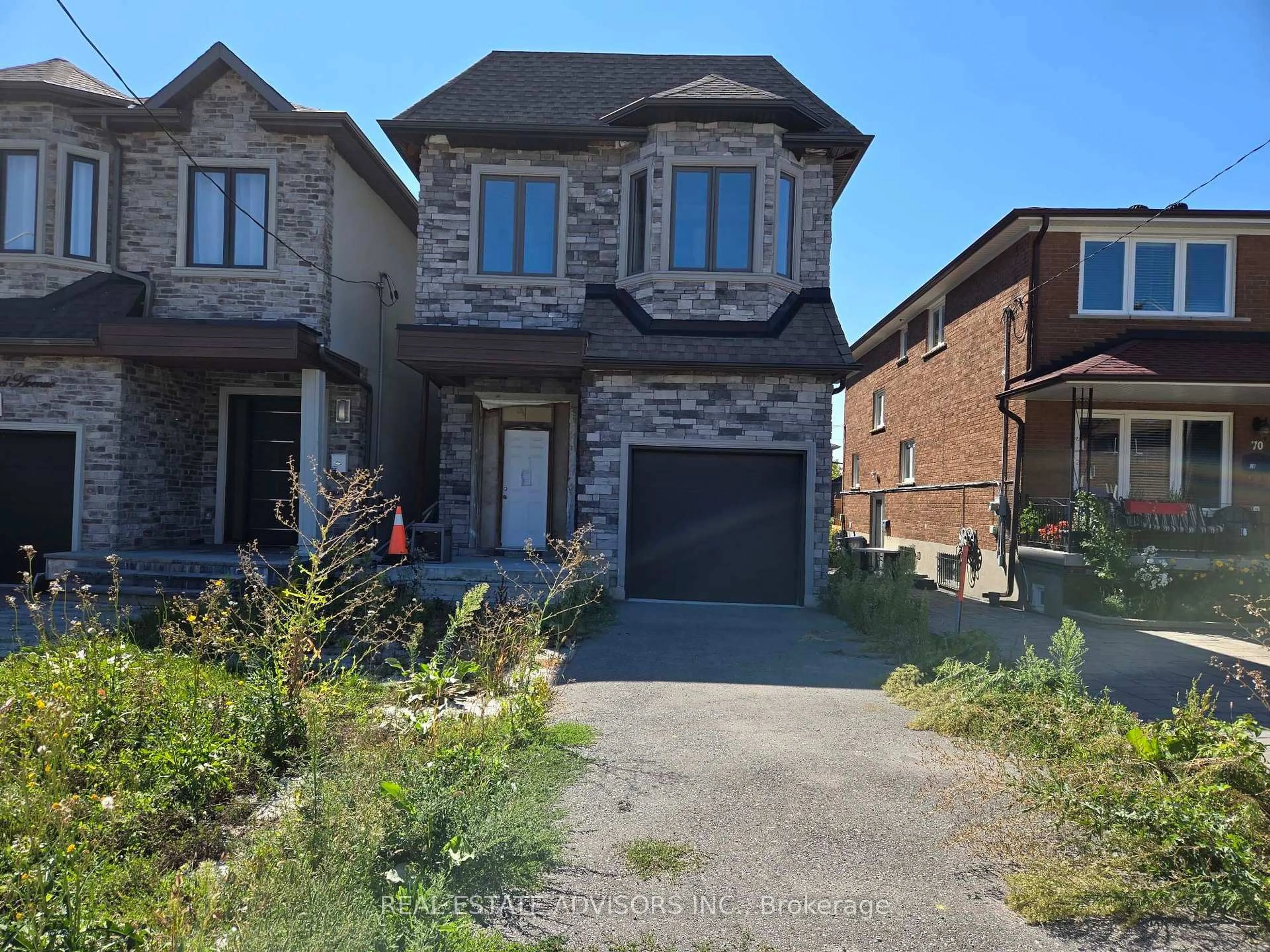 Home with brick exterior material, street for 68B Laurel Ave, Toronto Ontario M1K 3J6