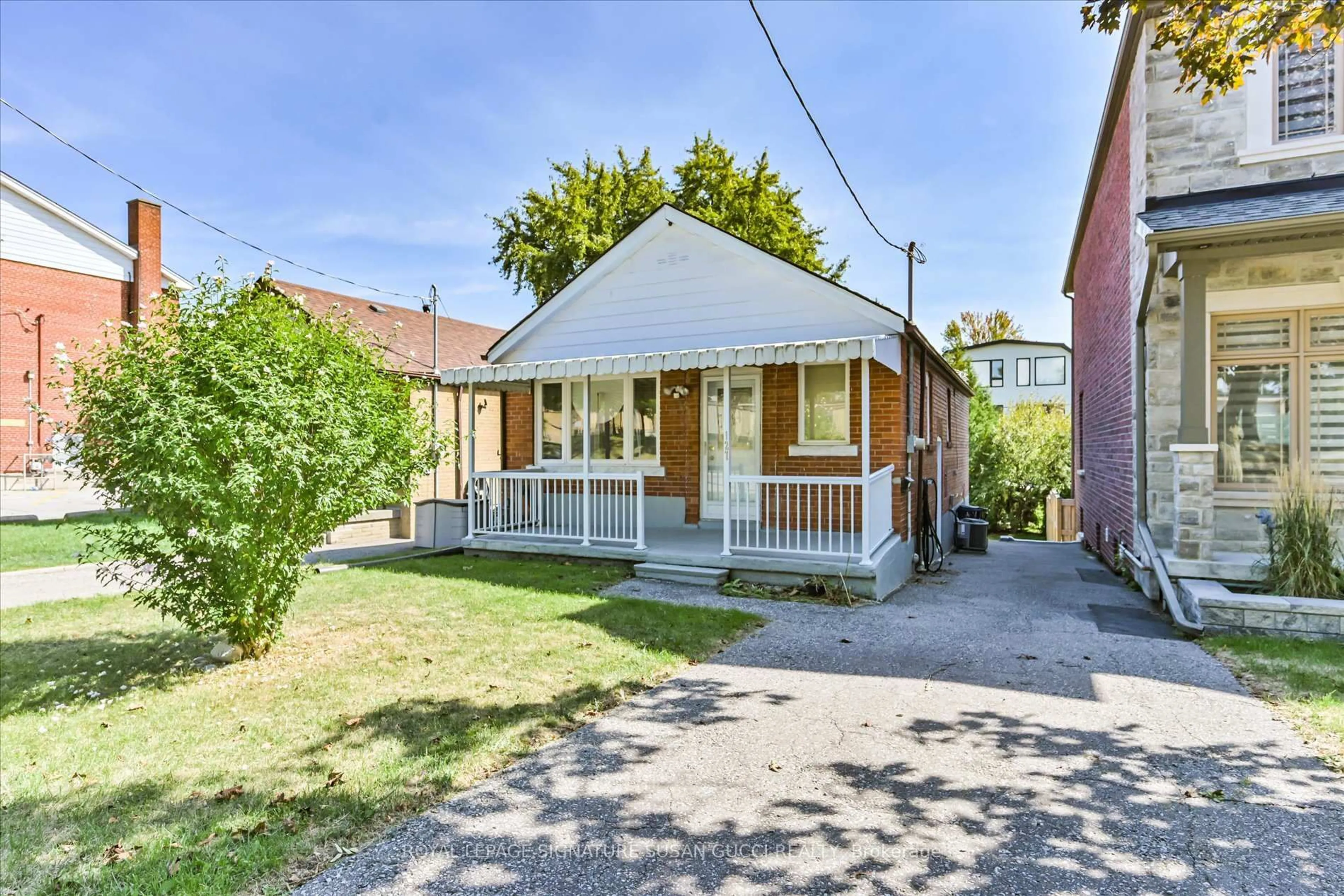 Home with brick exterior material, street for 127 Furnival Rd, Toronto Ontario M4B 1W7