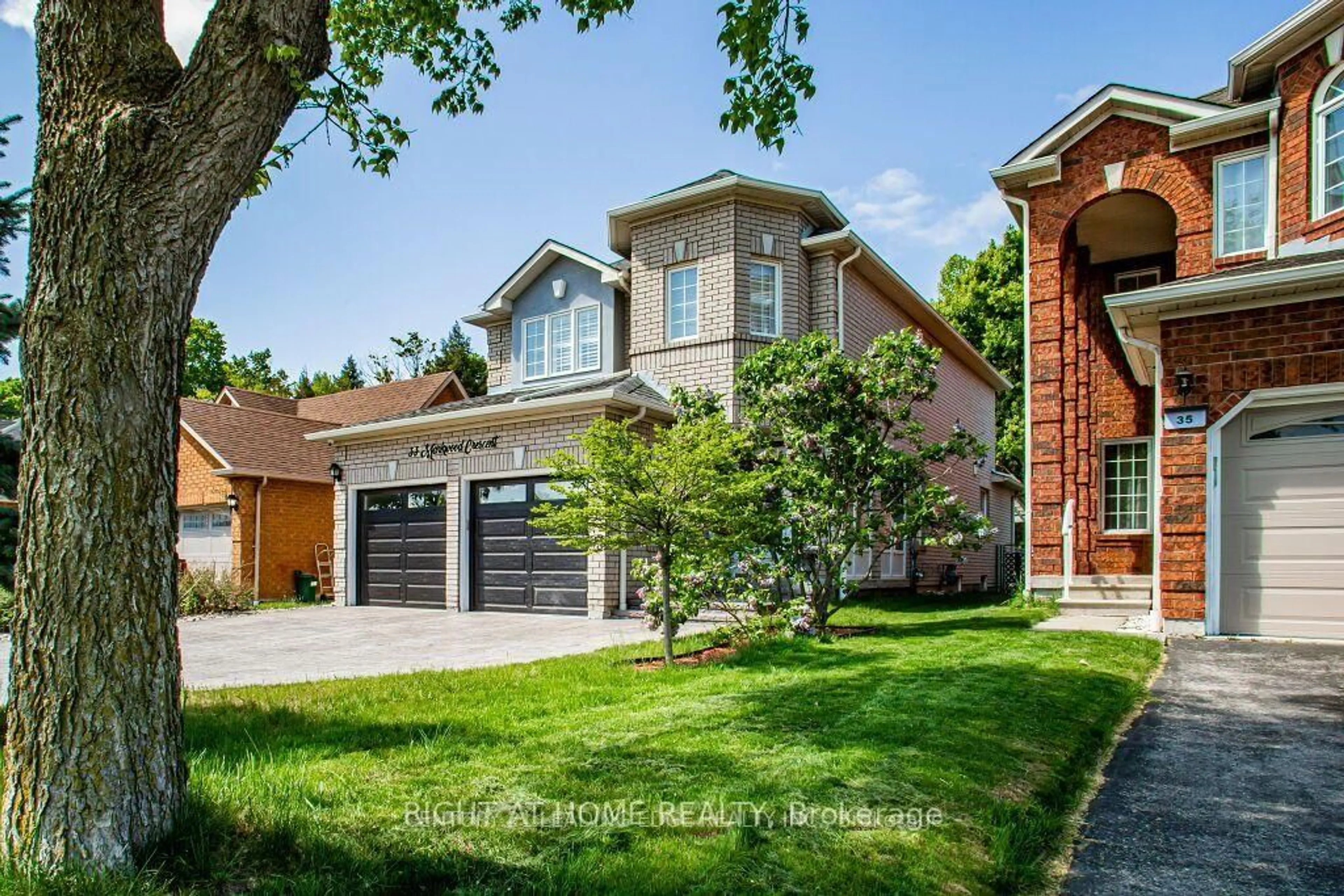 Home with brick exterior material, street for 33 Markwood Cres, Whitby Ontario L1R 2S3