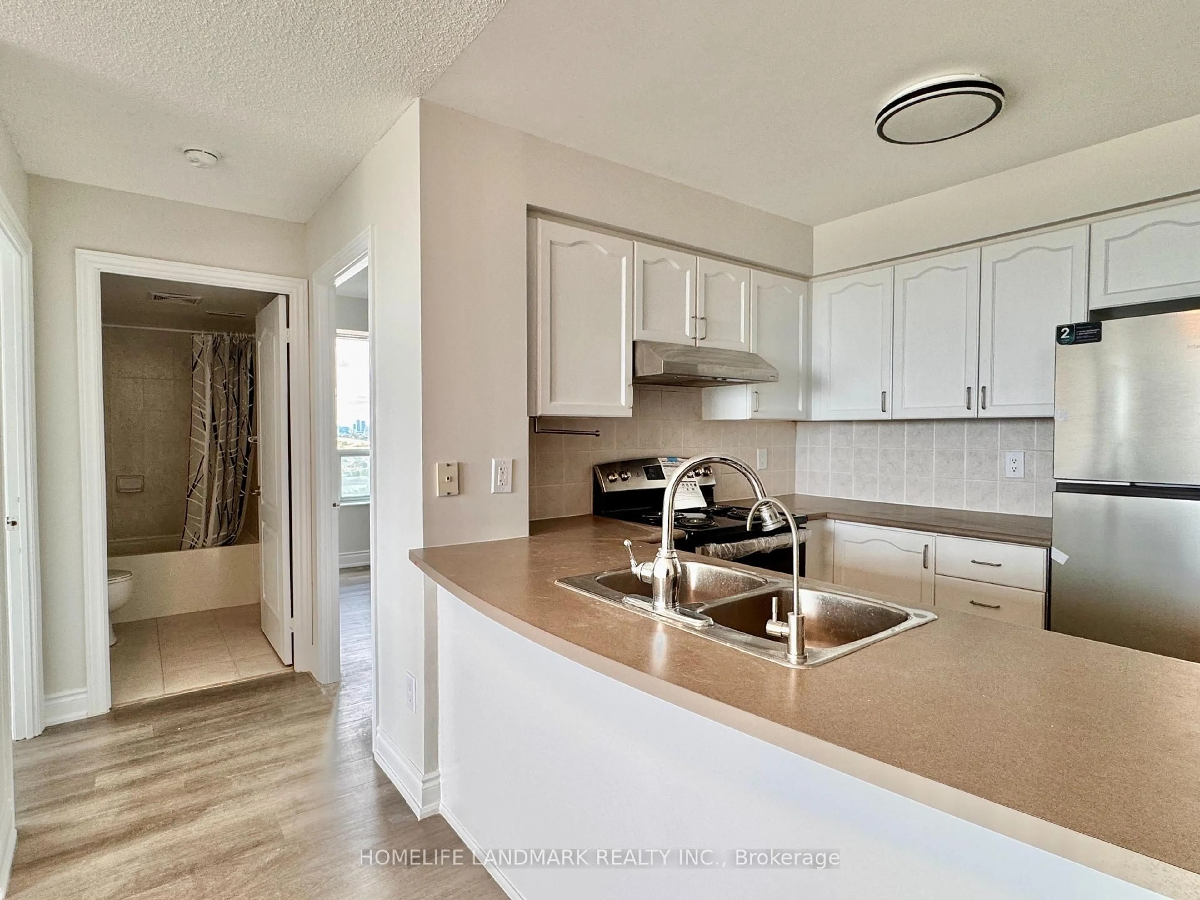 Open concept kitchen, ceramic/tile floor for 60 Brian Harrison Way #2302, Toronto Ontario M1P 5J5