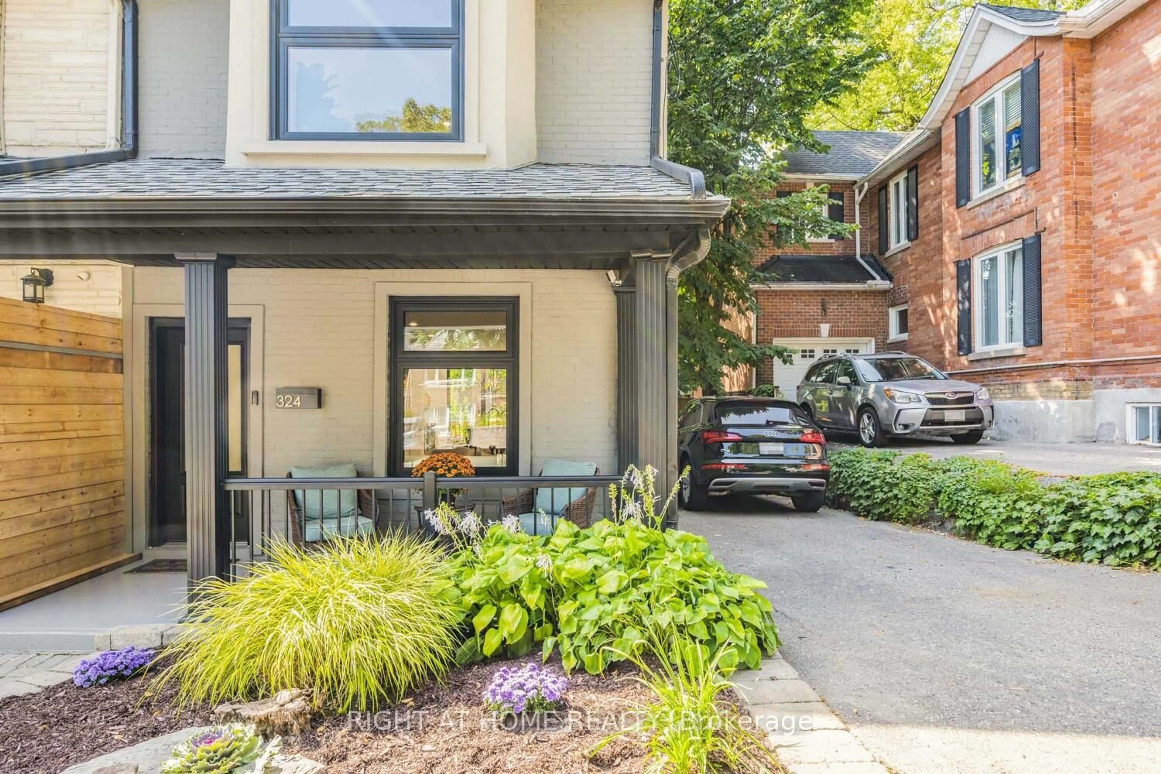 Home with brick exterior material, street for 324 Lee Ave, Toronto Ontario M4E 2P8