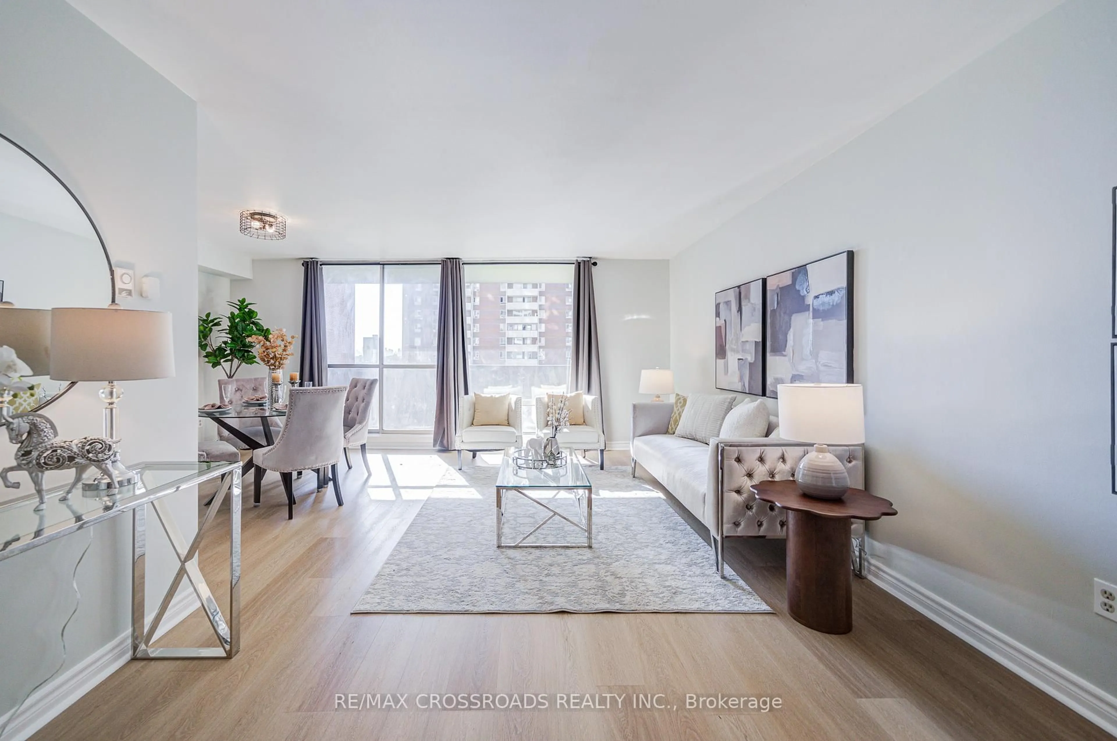 Living room with furniture, unknown for 5 Massey Sq #1202, Toronto Ontario M4C 5L6