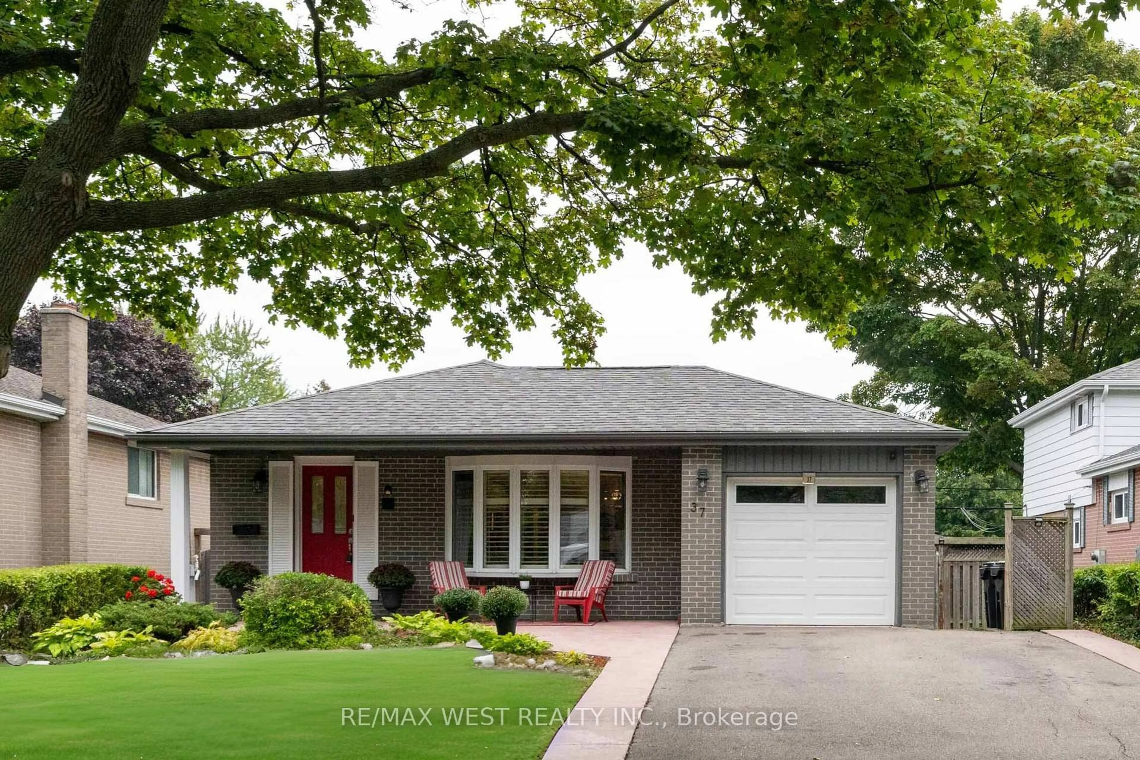 Home with brick exterior material, street for 37 Bledlow Manor Dr, Toronto Ontario M1E 1B1