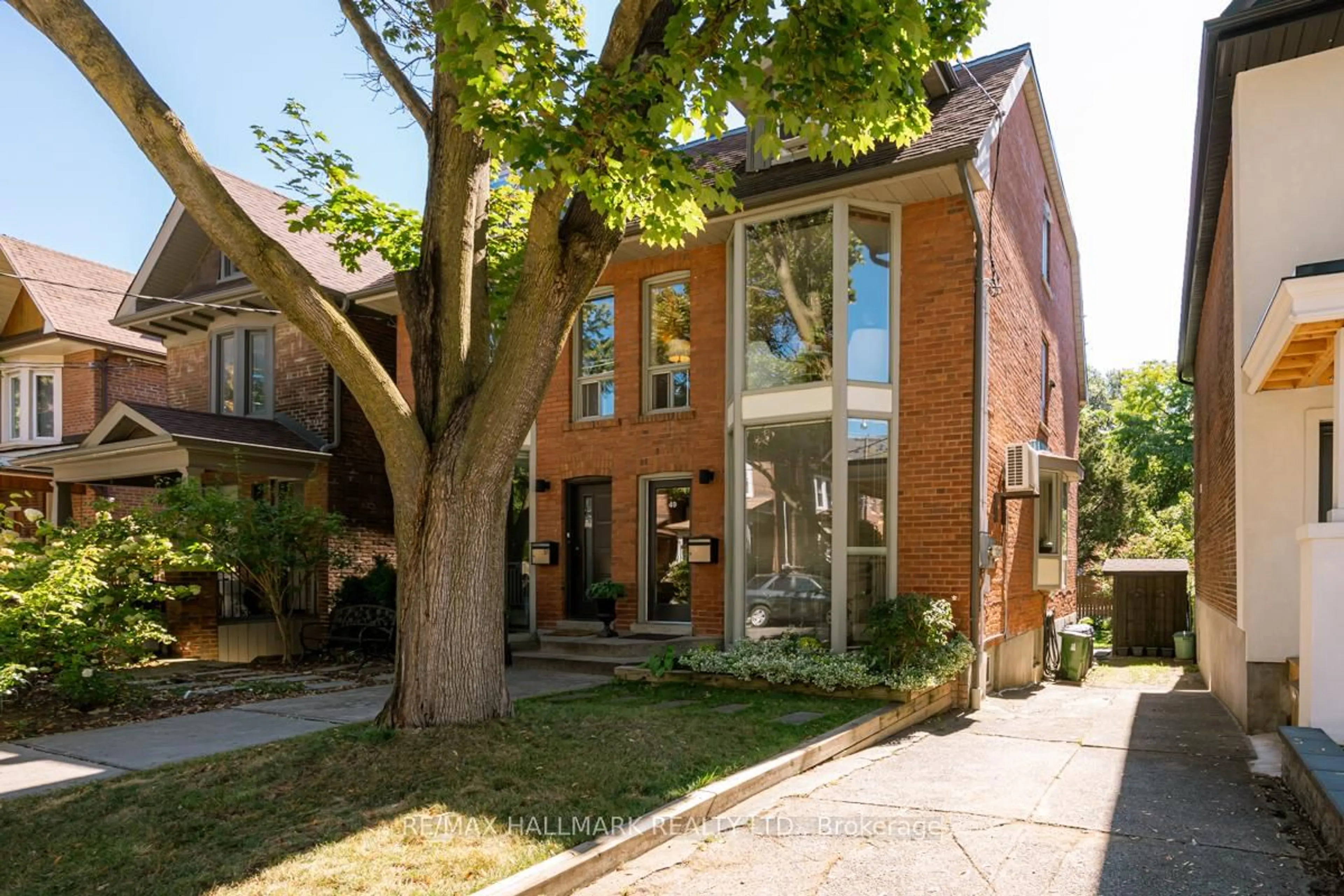 Home with brick exterior material, street for 49 Harcourt Ave, Toronto Ontario M4J 1J3
